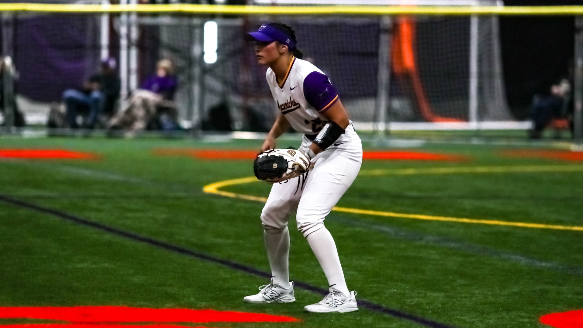 Nyah Hulbert stands ready in the outfield