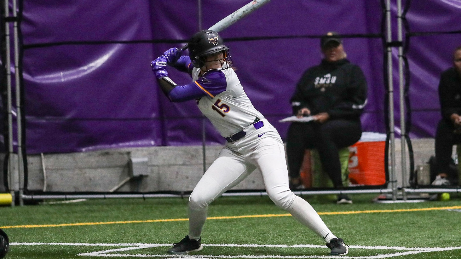 Finley Anderson up to bat inside the Maverick All-Sports Dome