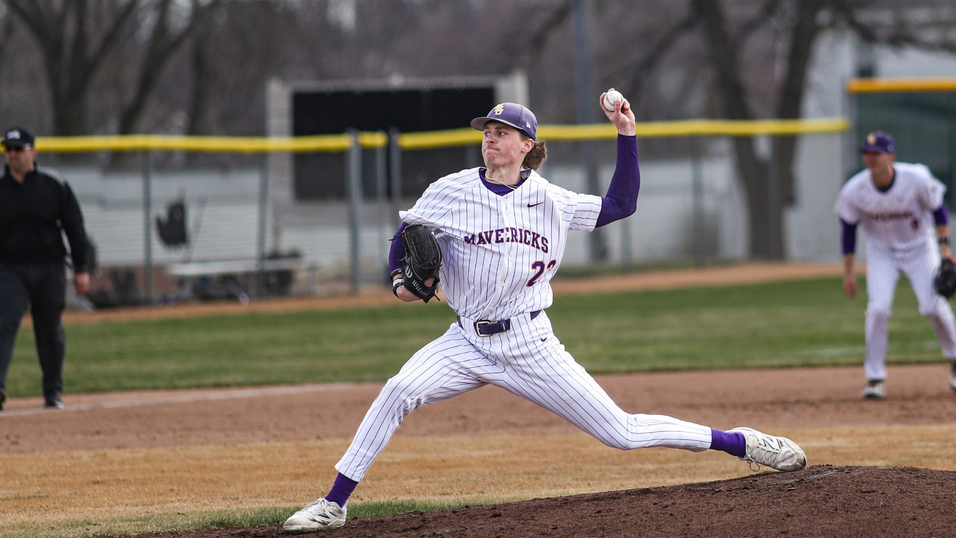 Sam George throwing a pitch vs Wayne State 