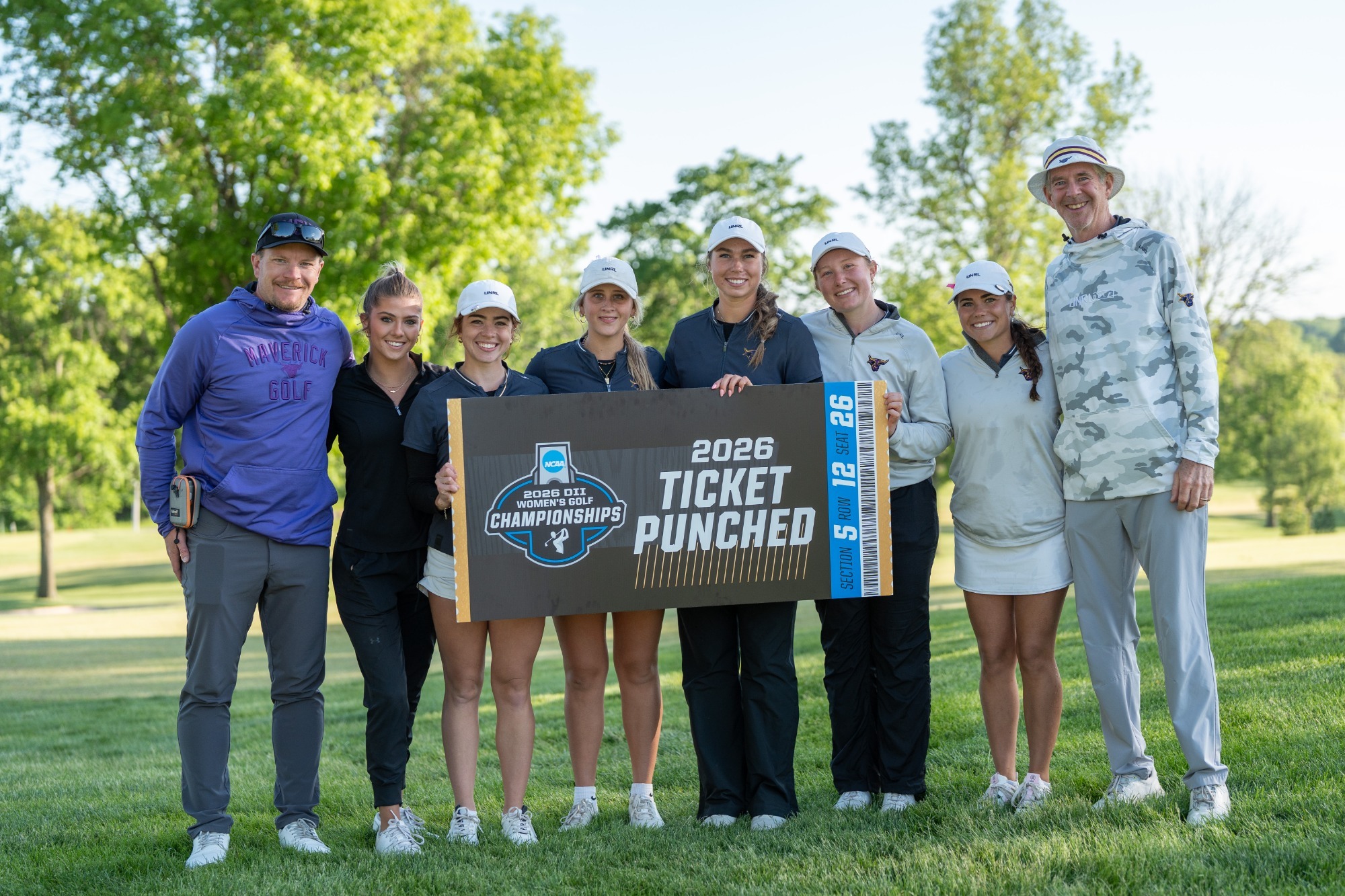 A photo of the Women's Golf Team after advancing to the NCAA Championships