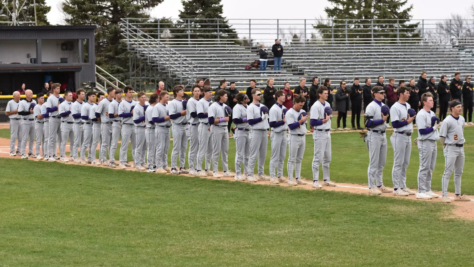 Minnesota State lines up for the national anthem
