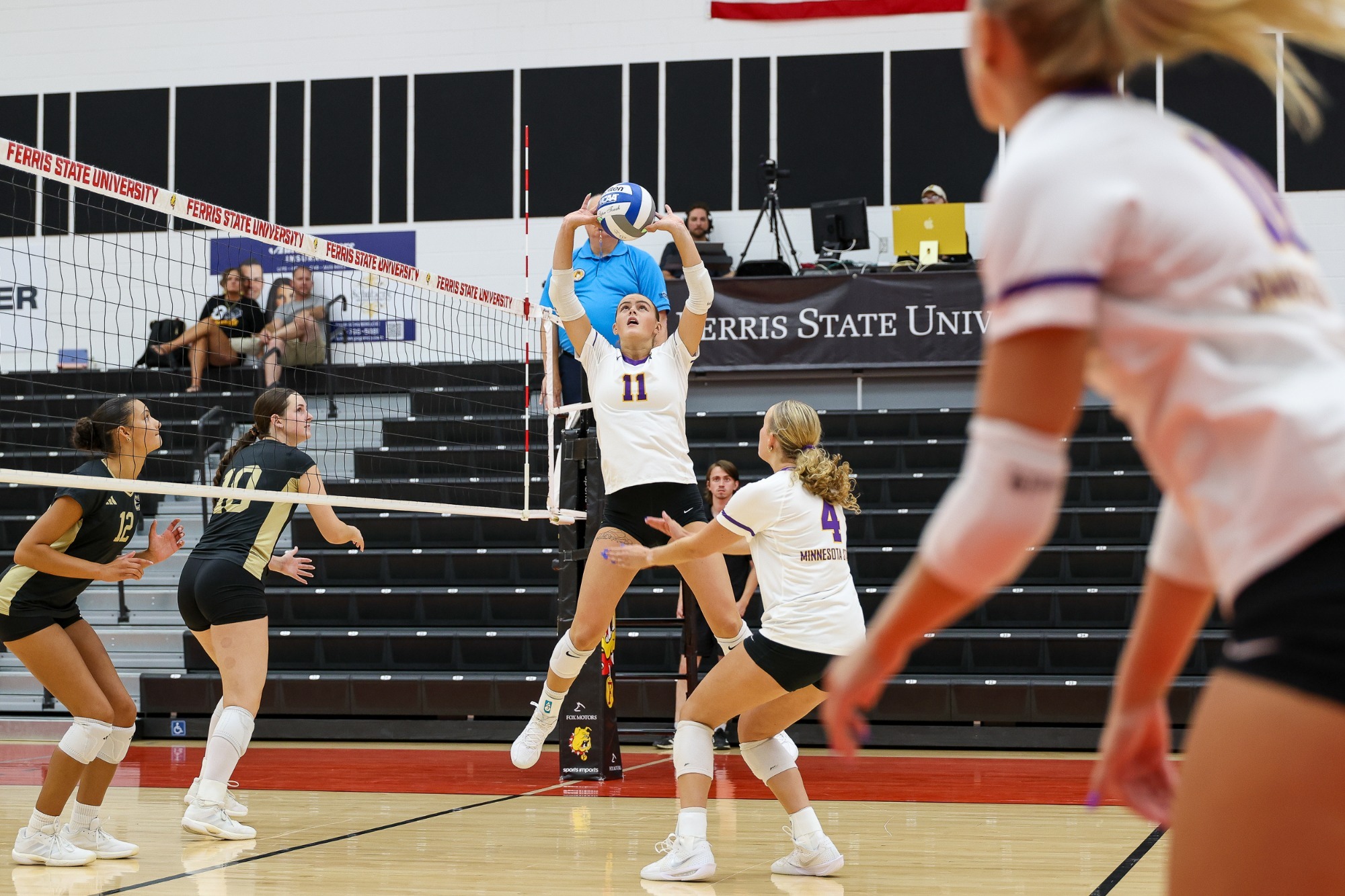 Jadyn Lester setting the volleyball during MSU match against Emporia State
