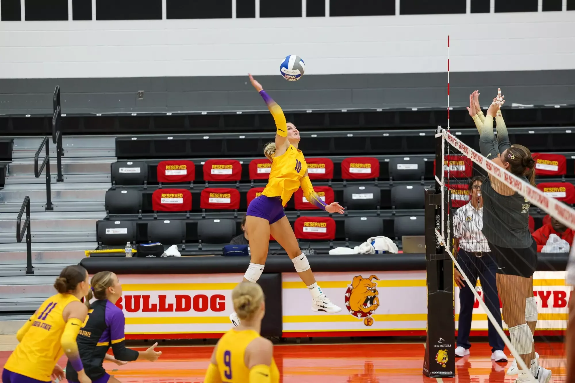 Addison Foor going up for a swing