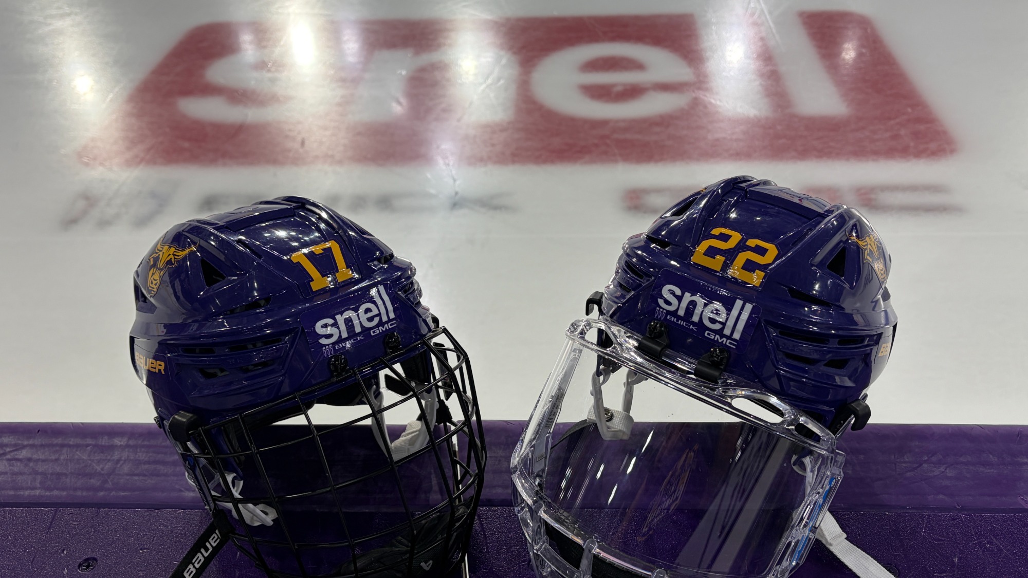 A graphic of the Snell logo as part of their sponsorship on the MSU hockey helmet.