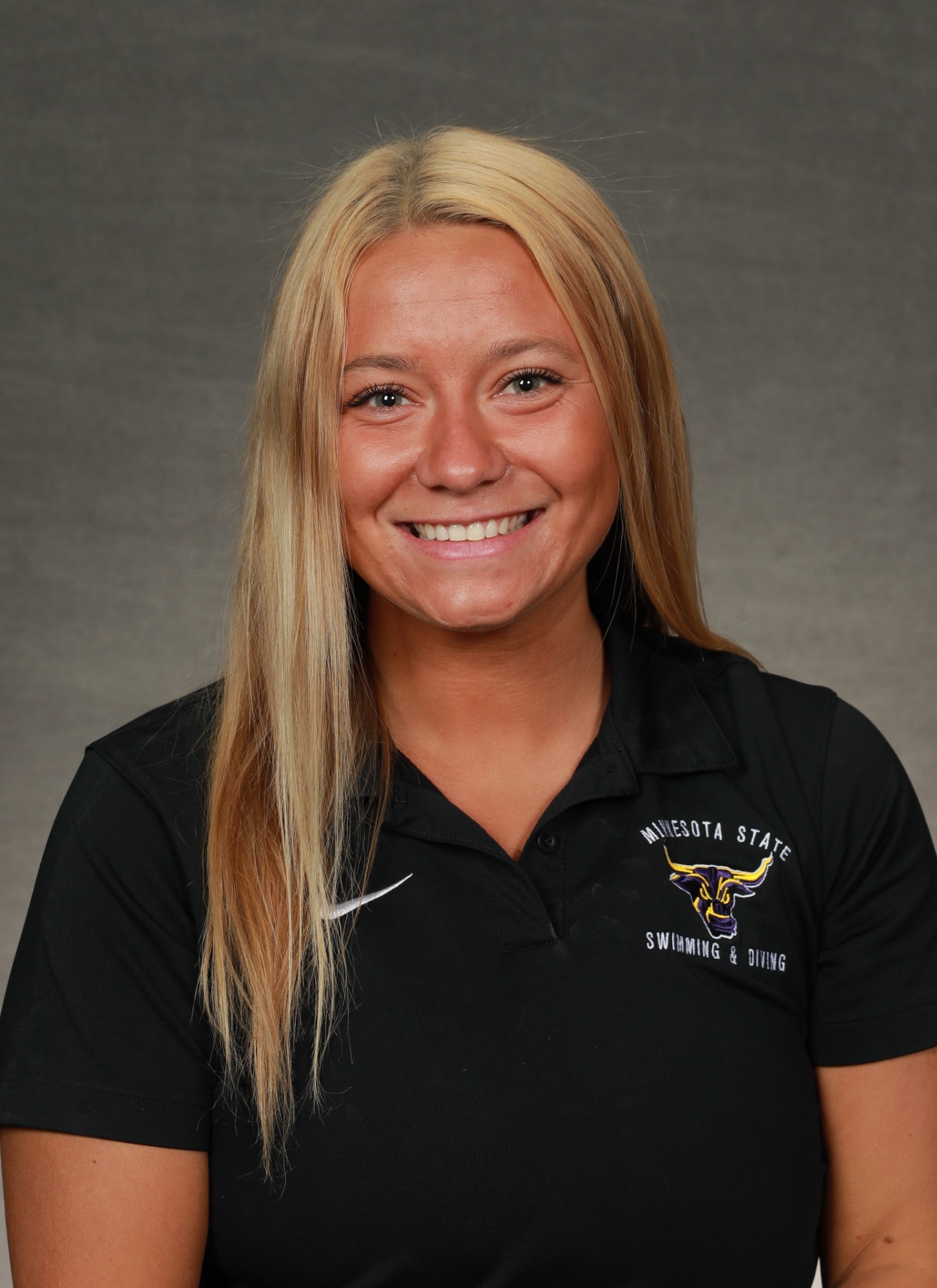 A headshot of Hailey Stack