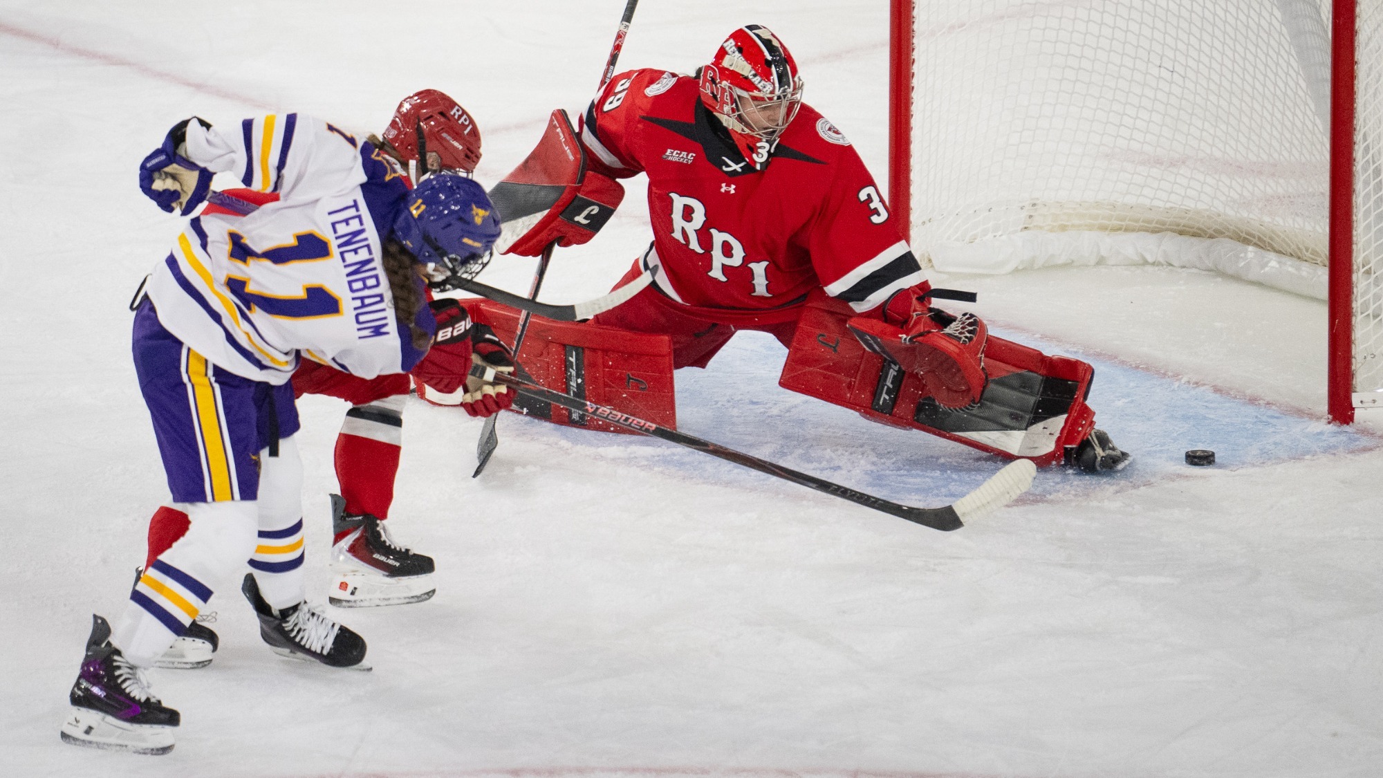 Lucie Tenebaum battles in front of the net