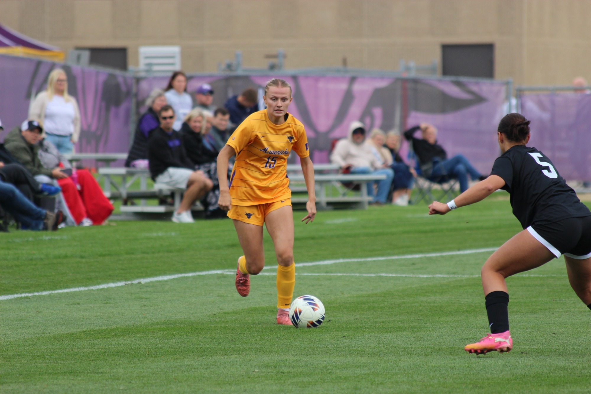 Lauren Schindler dribbles the ball