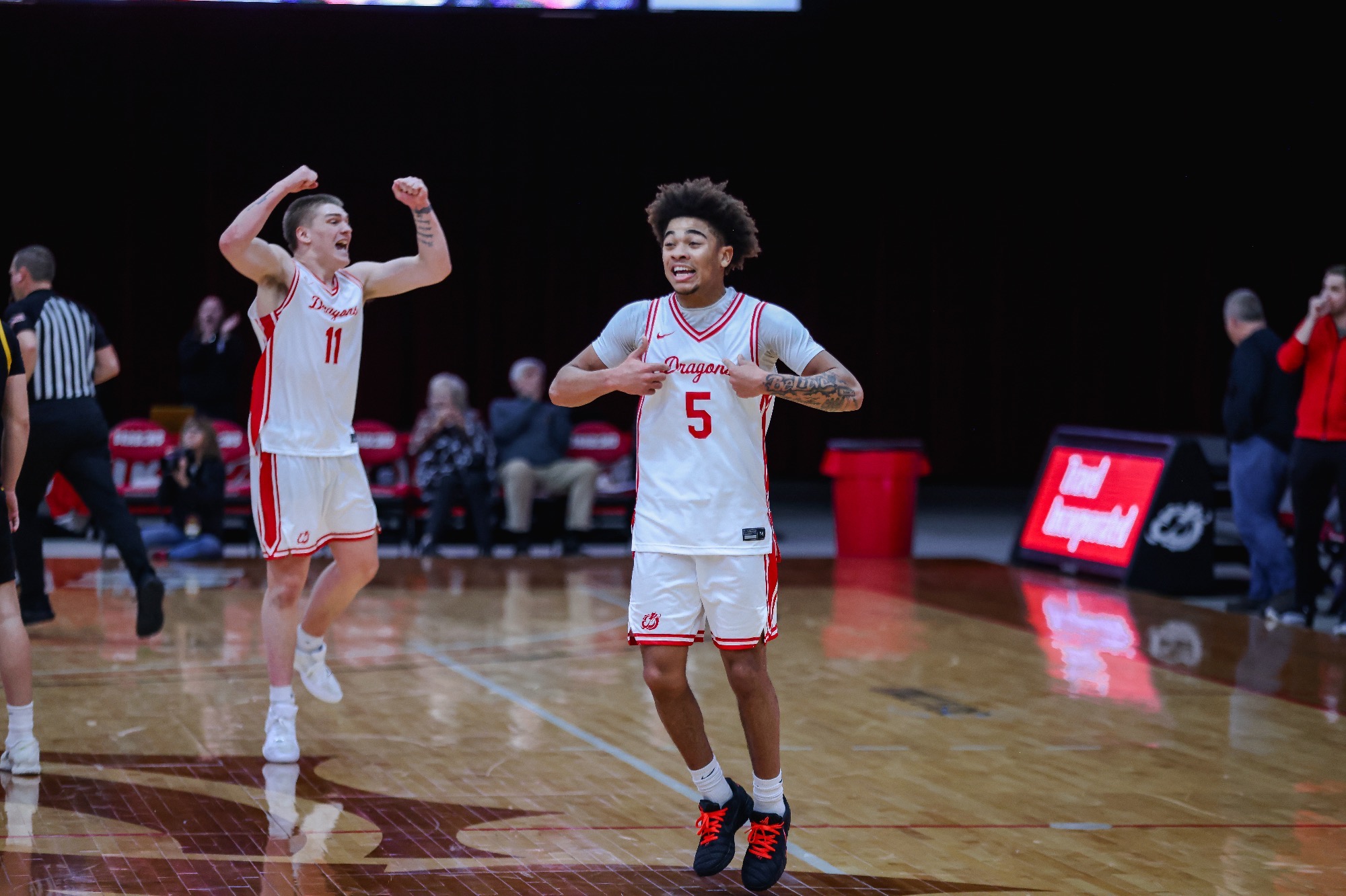Isa El-Amin celebrates after sinking the eventual game-winning three-pointer against Minnesota Duluth on Saturday. 