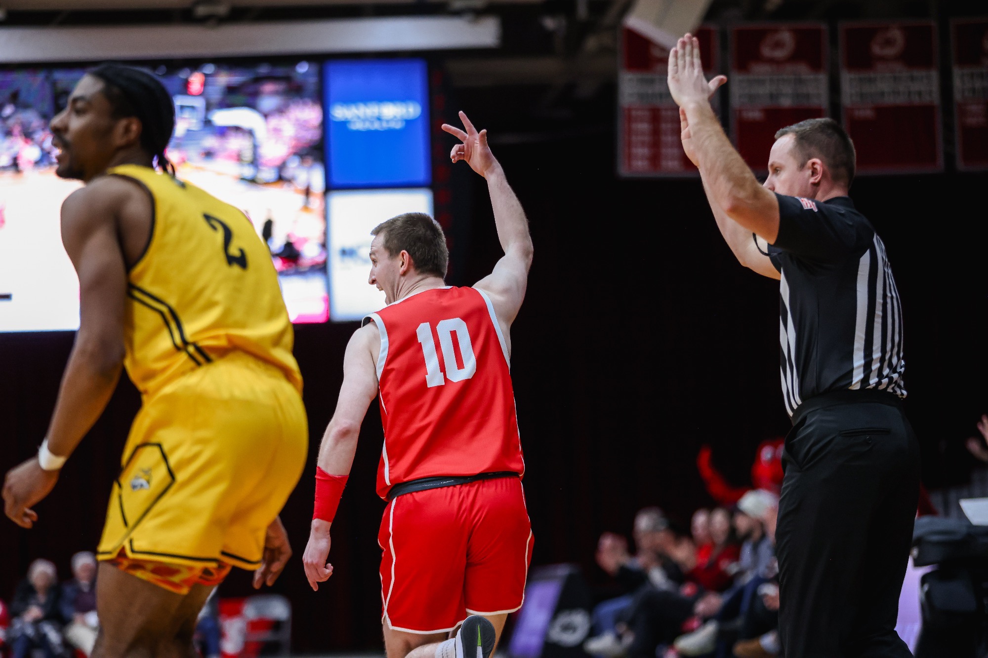 Eddie Beeninga celebrates a three-pointer in MSUM's 84-73 win over Wayne State. 