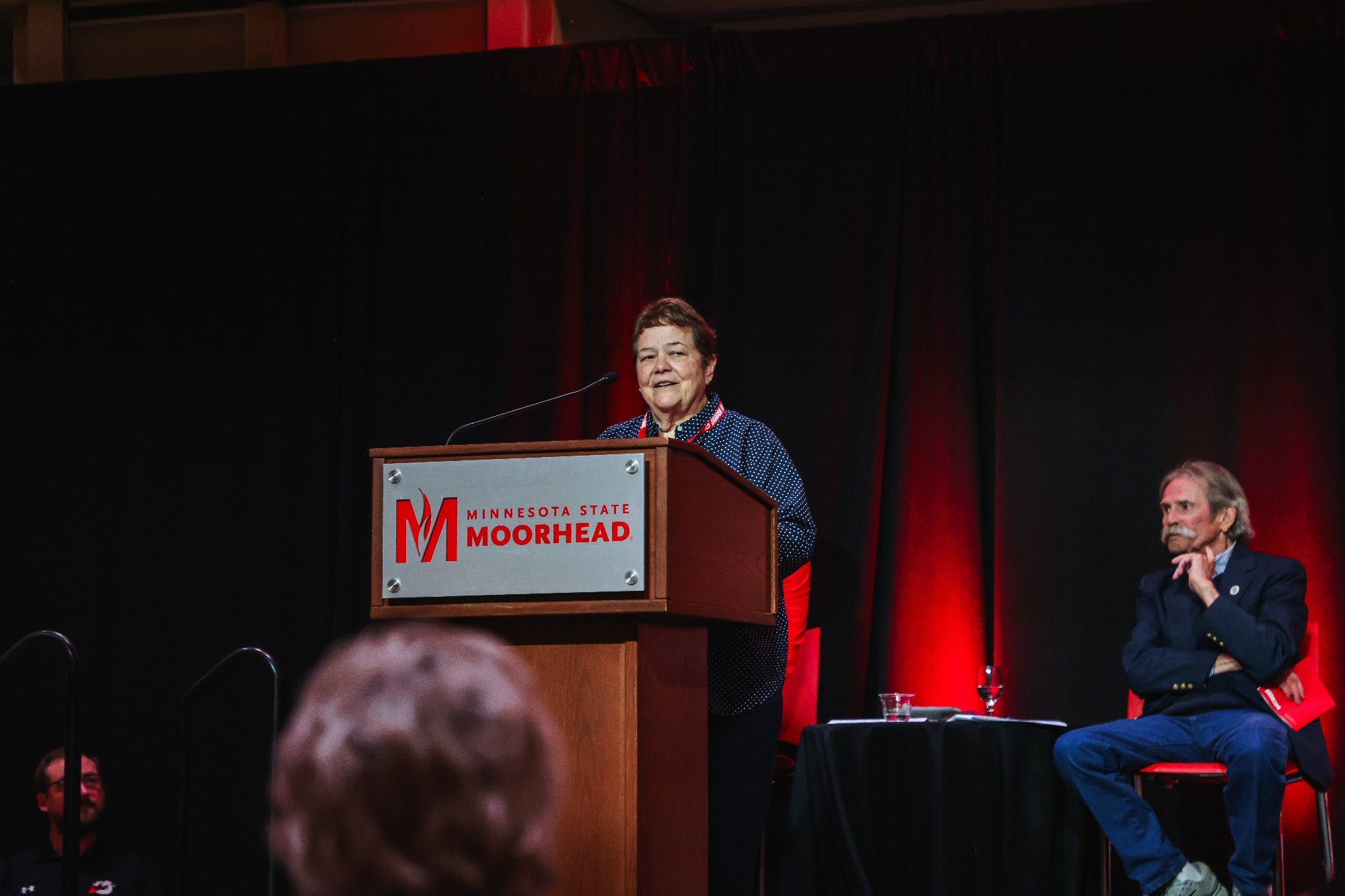 Legendary head coach Judy Bowers gives her acceptance speech at the 2025 Dragon Athletic Hall of Fame banquet. 