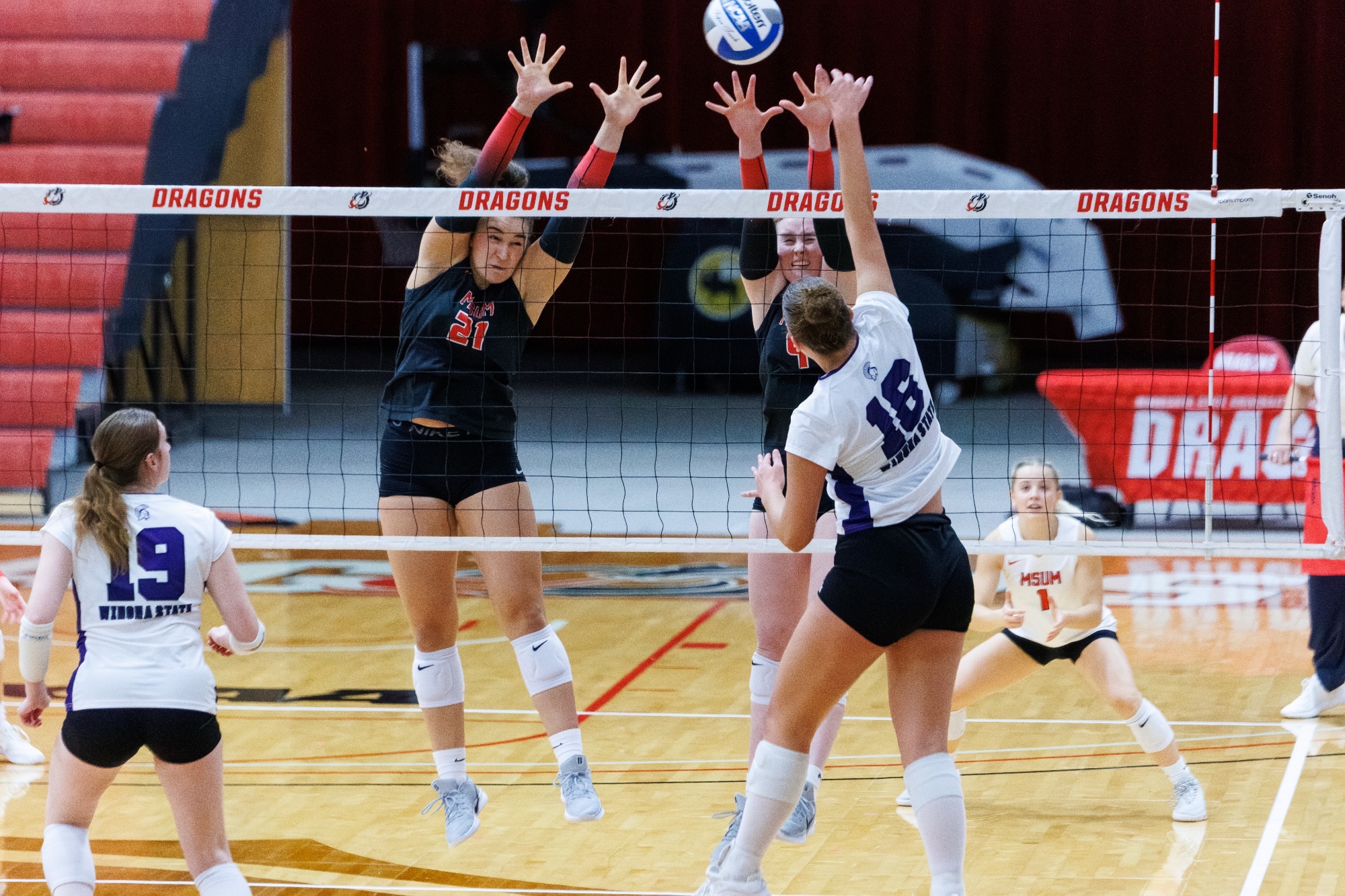 Leah Laqua (left) had six kills and three total blocks in a three-set win over Winona State on Saturday.