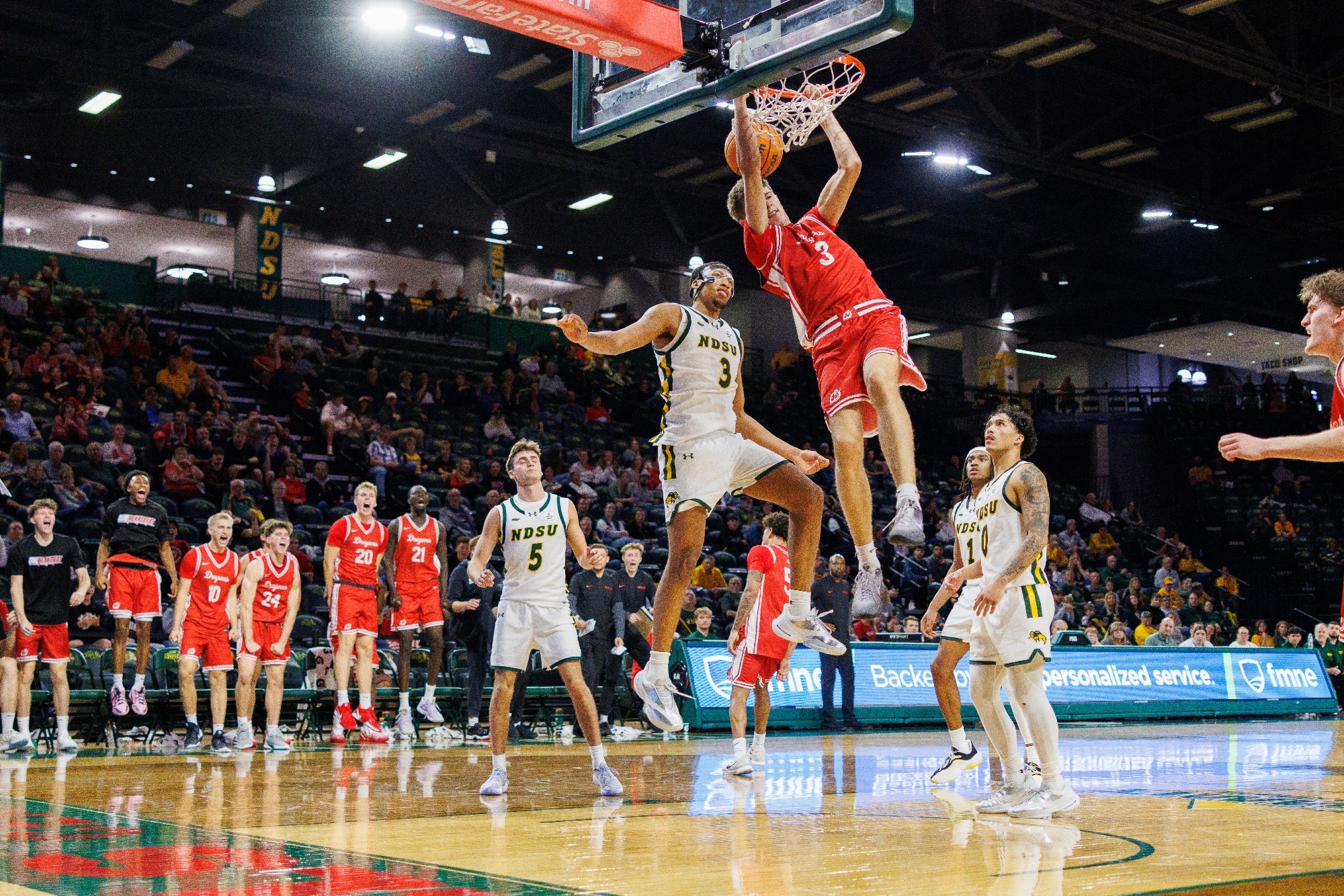 Lincoln Rogers scores two of his 12 points on a baseline slam against North Dakota State