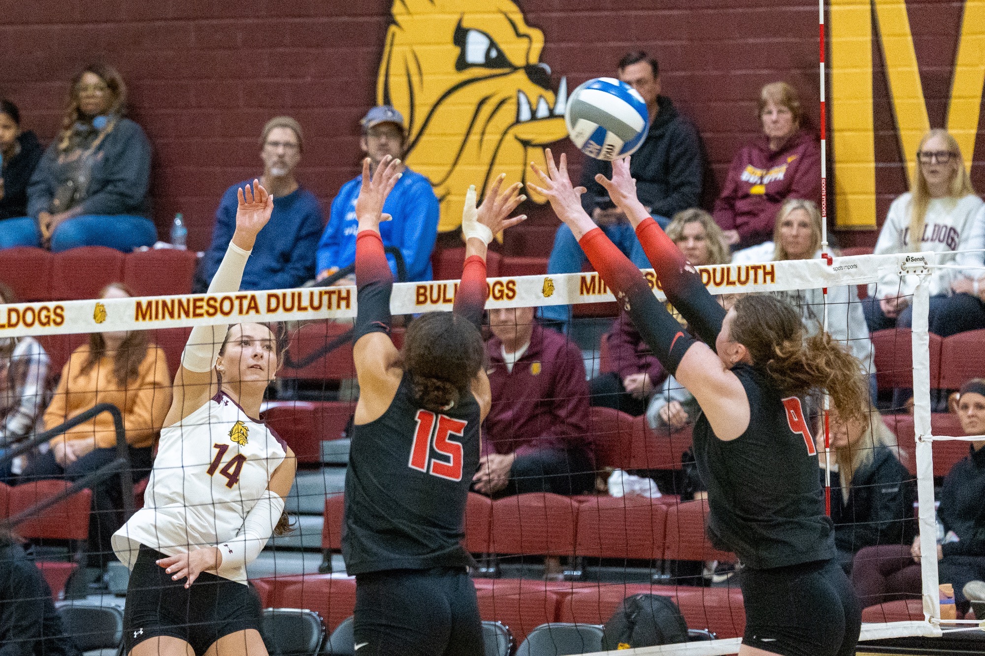 Mya Pfeifer (left) and Brielle Riess (right) combined for 22 kills in MSUM's five-set win over #19 UMD