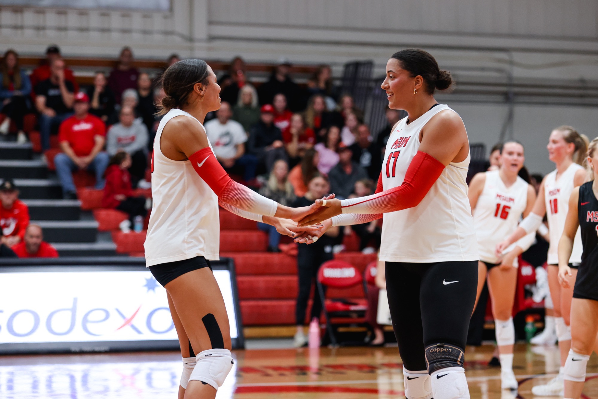 Raiah Mandell (right) and Mya Pfeifer (left) combined for 16 kills in a loss to #8 CSP on Friday