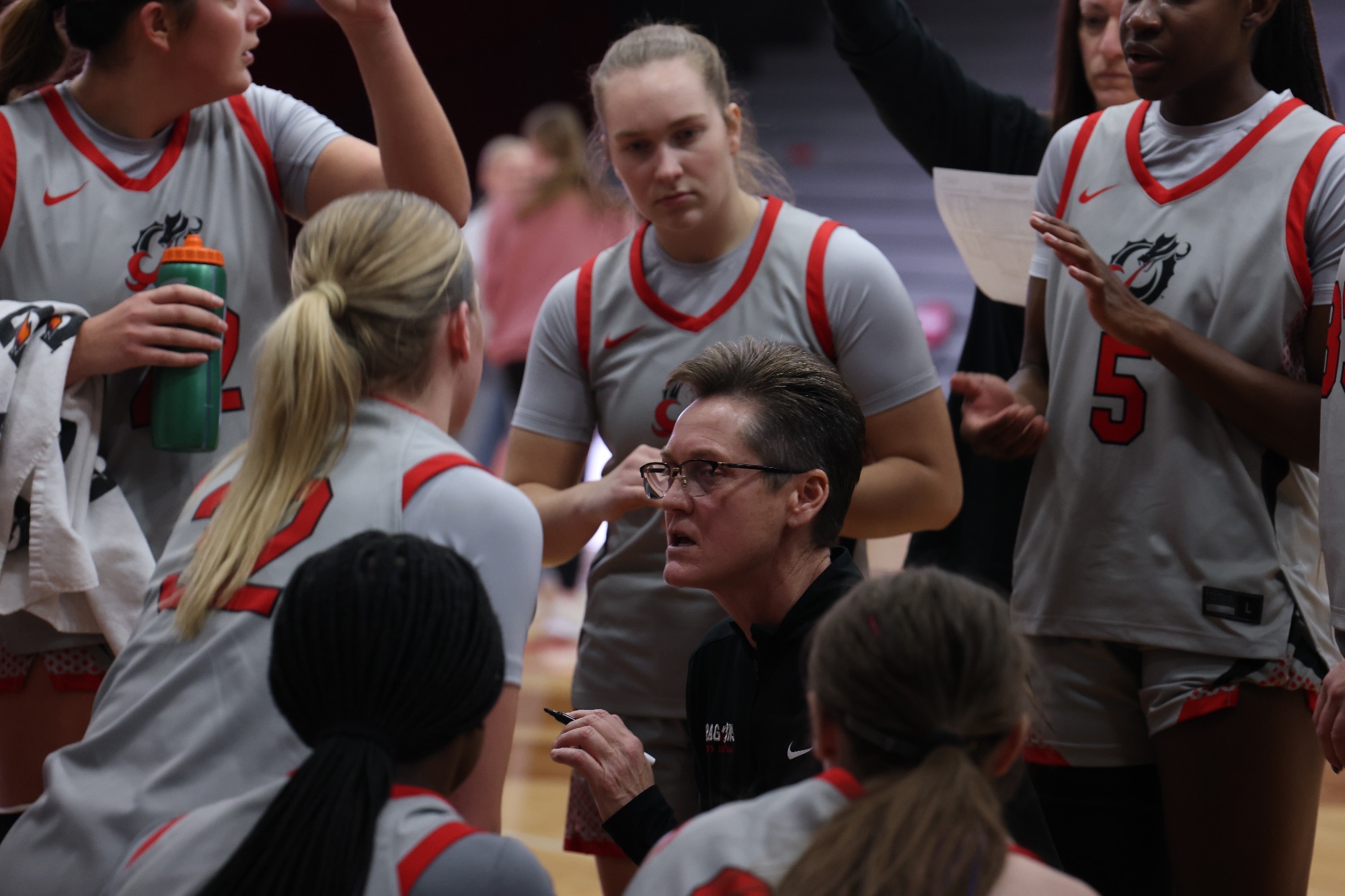 Karla Nelson in huddle