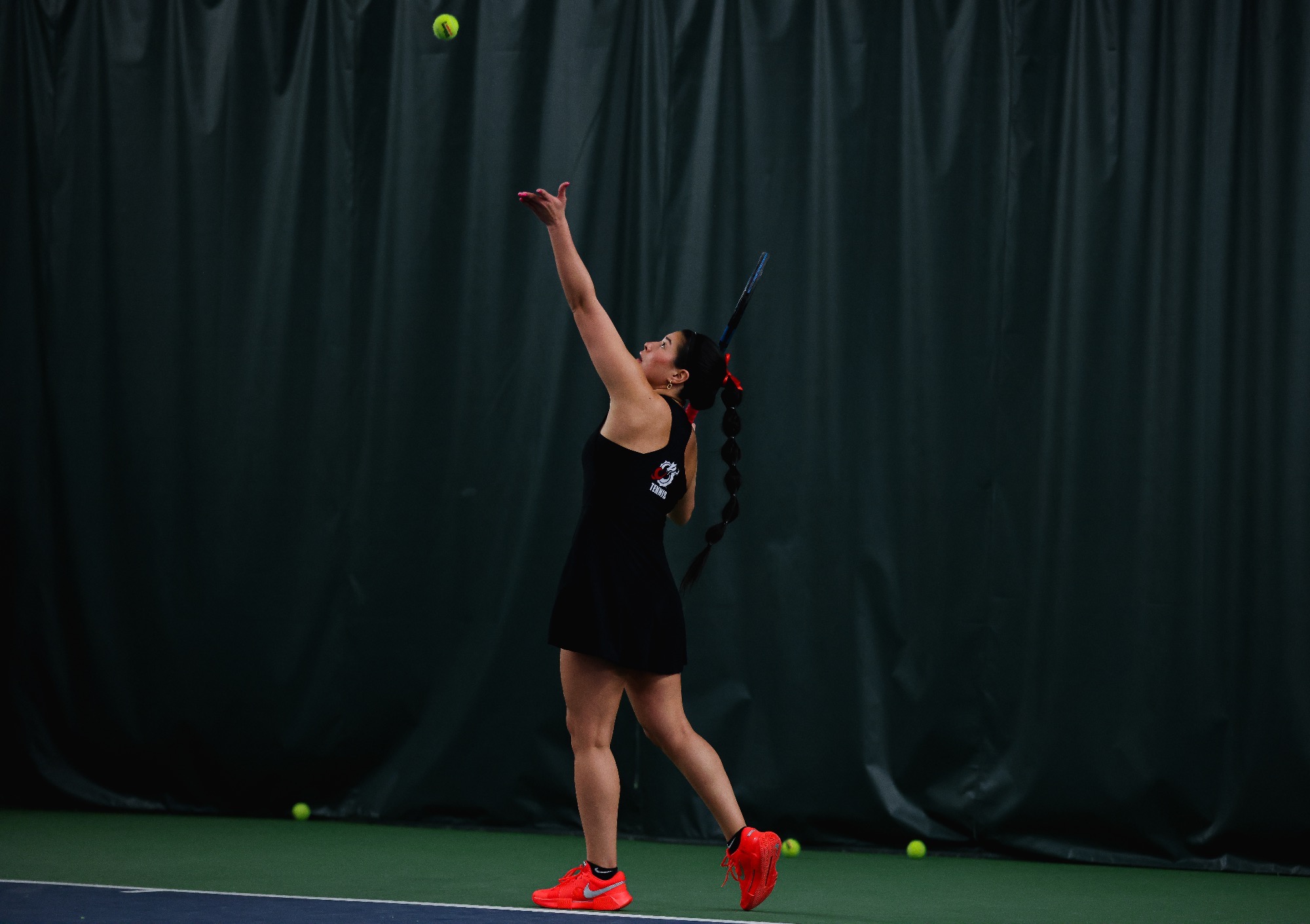 Luzmary Diaz Castillo helped the Dragons to a win at number one doubles against Northwood to begin the program's Spring Break trip. 