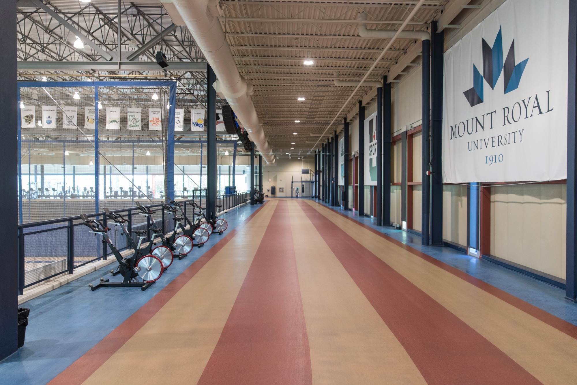 5 lanes of the running track within the MRU Recreation facility.