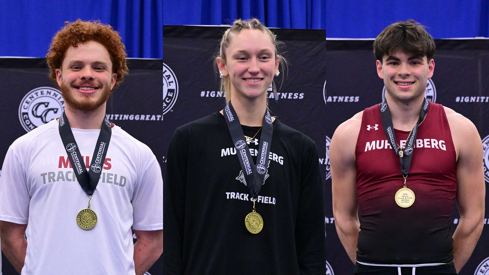 three athletes with gold medals around their necks; from left a man in a white t-shirt, a woman in a black sweatshirt, and a man in a red jersey