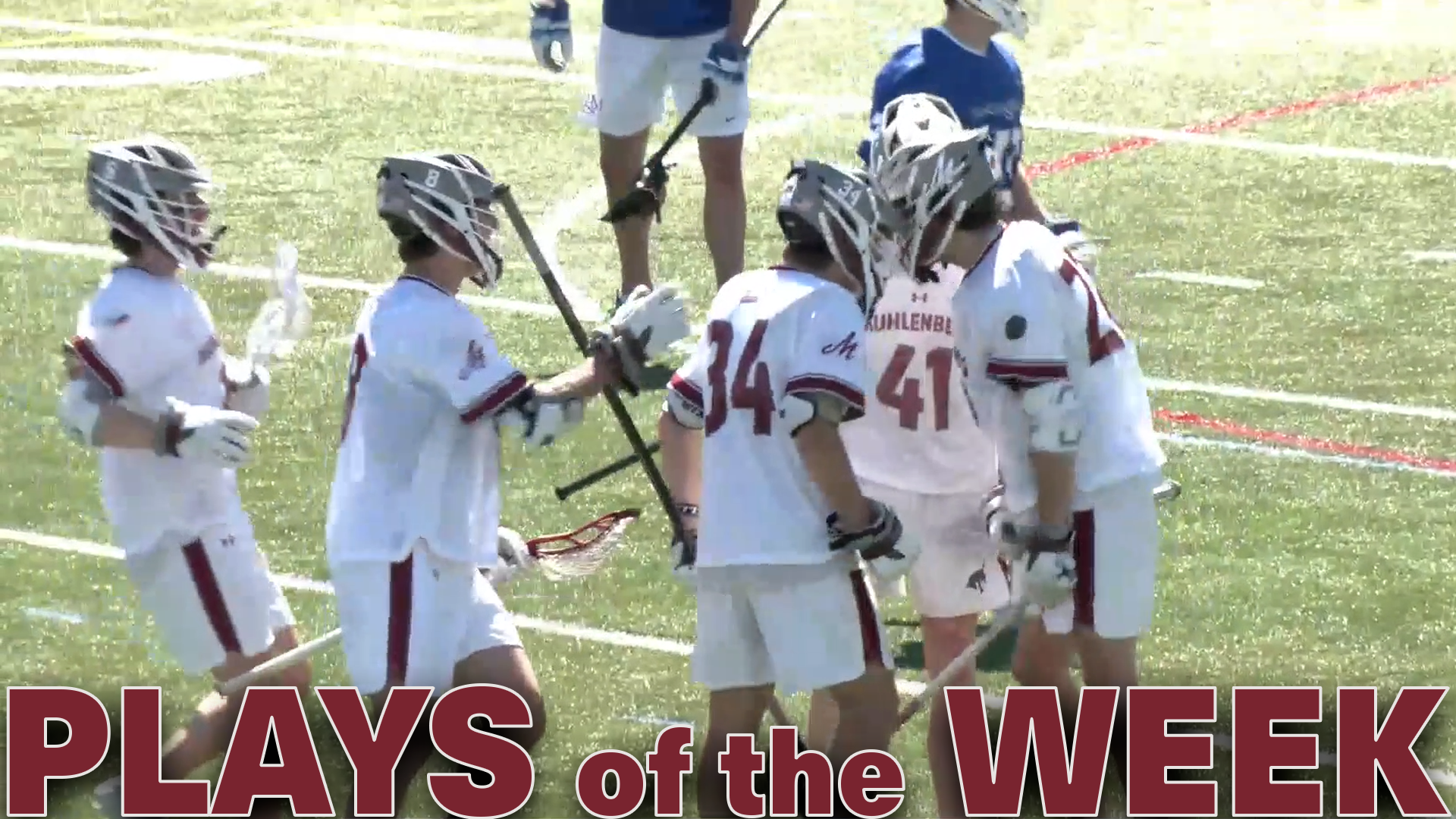 men's lacrosse players in white jerseys and grey helmets celebrating a goal, with the text Plays of the Week in red at the bottom