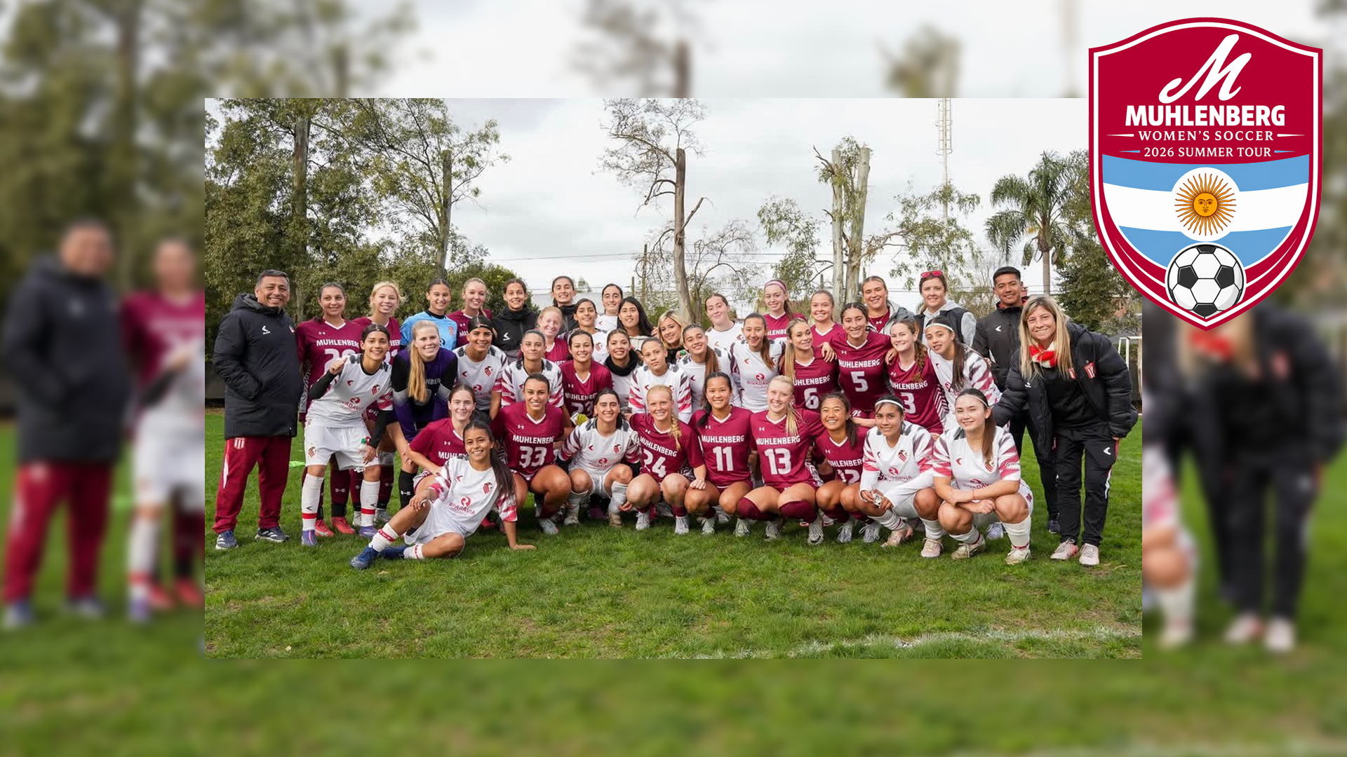 two women's soccer teams, one in red uniforms and one in white uniforms, posing together for an outdoor photo