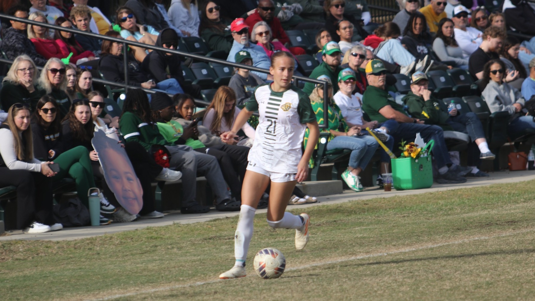 Gabby Riemer with the ball against William Peace