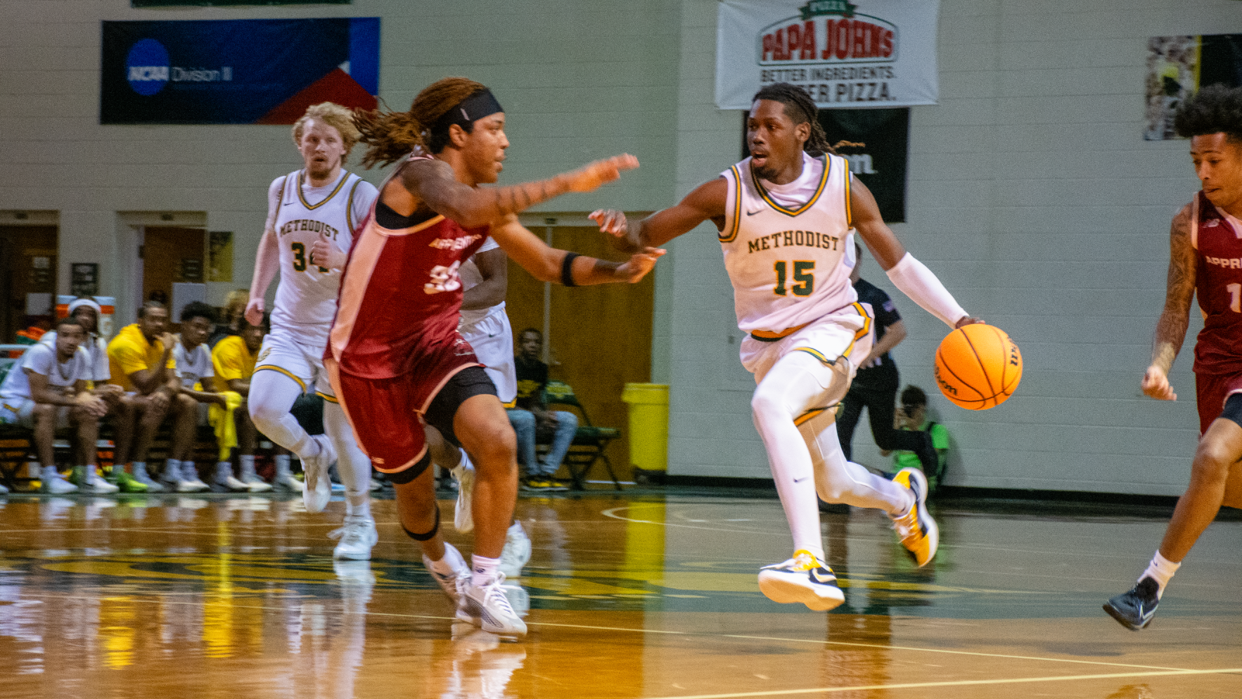 Mike Fee dribbling with defender