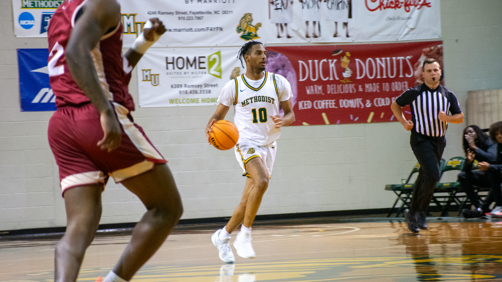 Dontavious Pettaway dribbling past midcourt