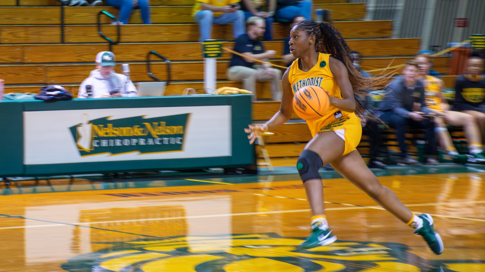 Jada Richardson dribbling up court