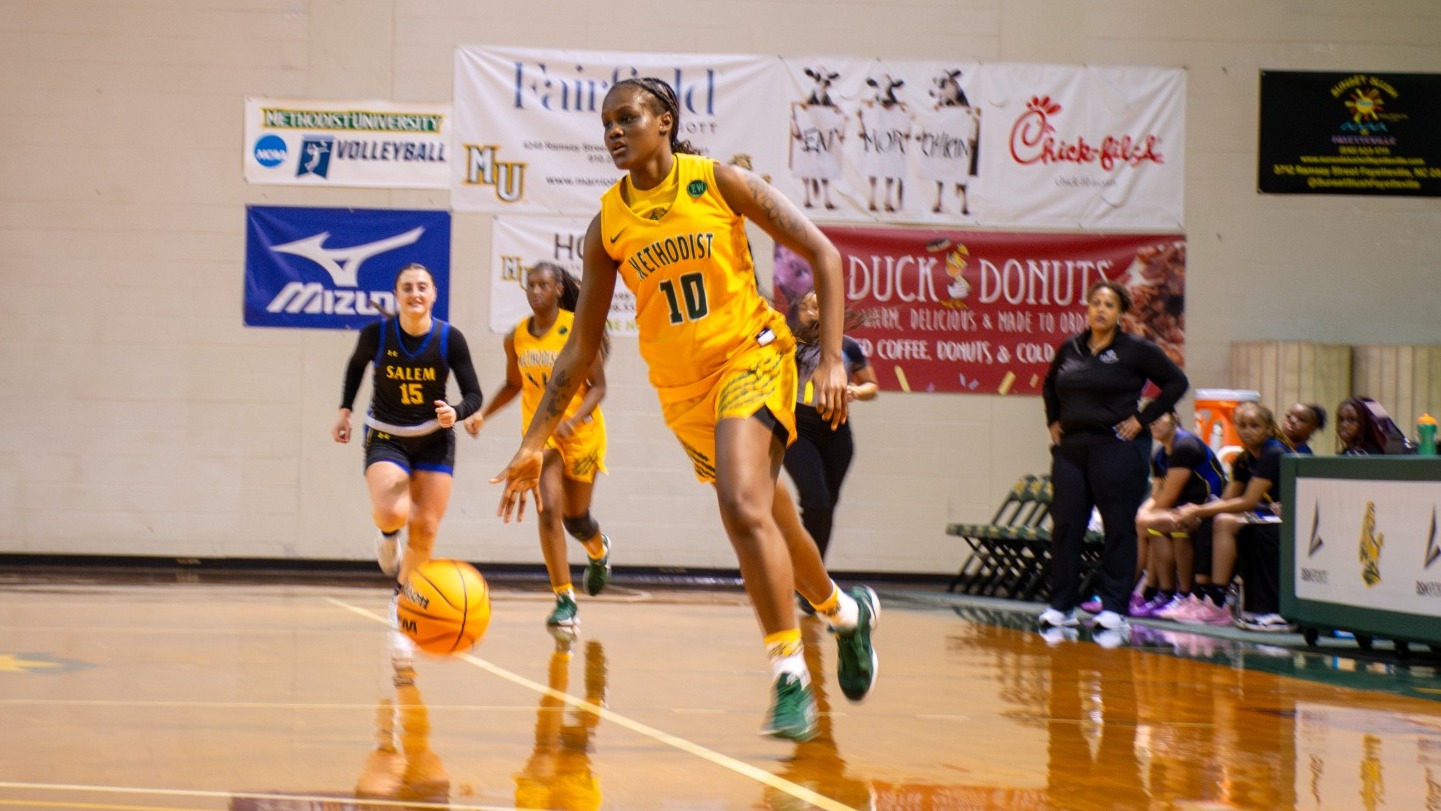 Korin Gladden dribbling up the court against Salem at home