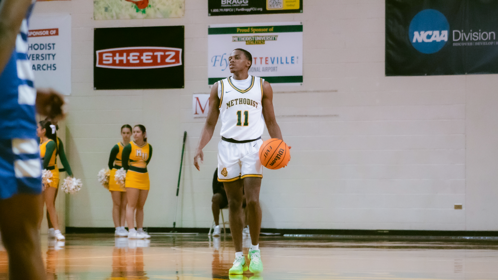 O'Montae Daniels dribbling up the court against Brevard
