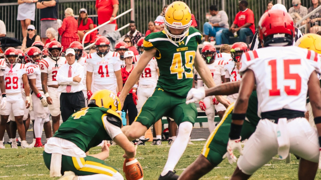 Ethan Emery kicking a field goal against Huntingdon