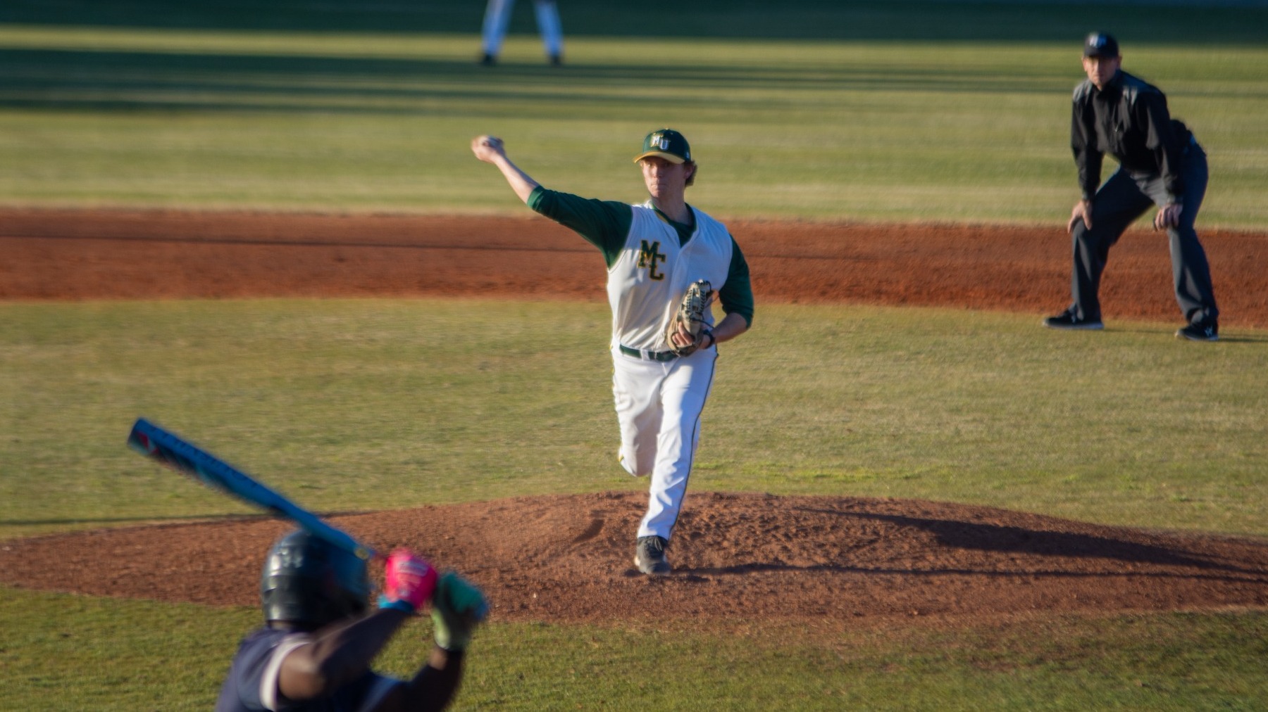 Pressley Patterson pitching in throwback jersey