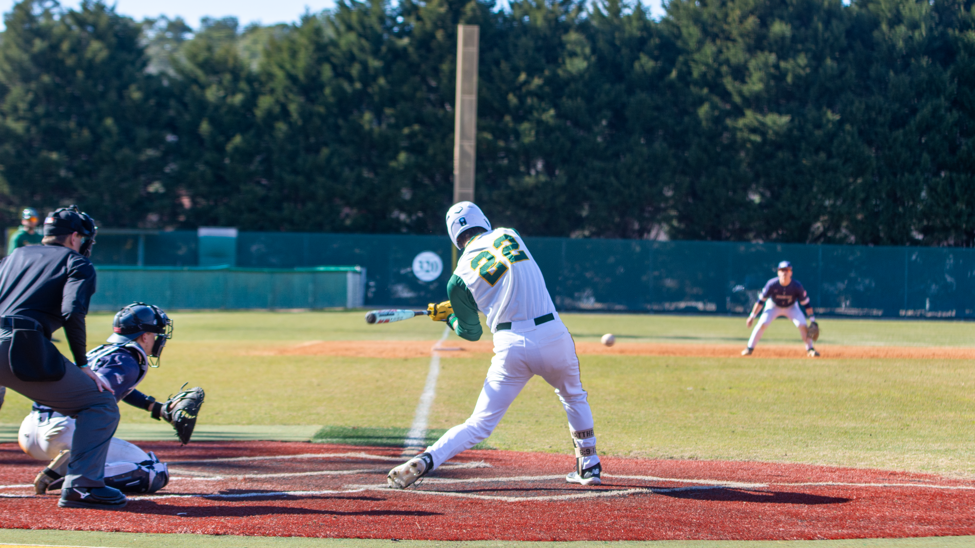 Israel Ortiz swinging vs Virginia Wesleyan
