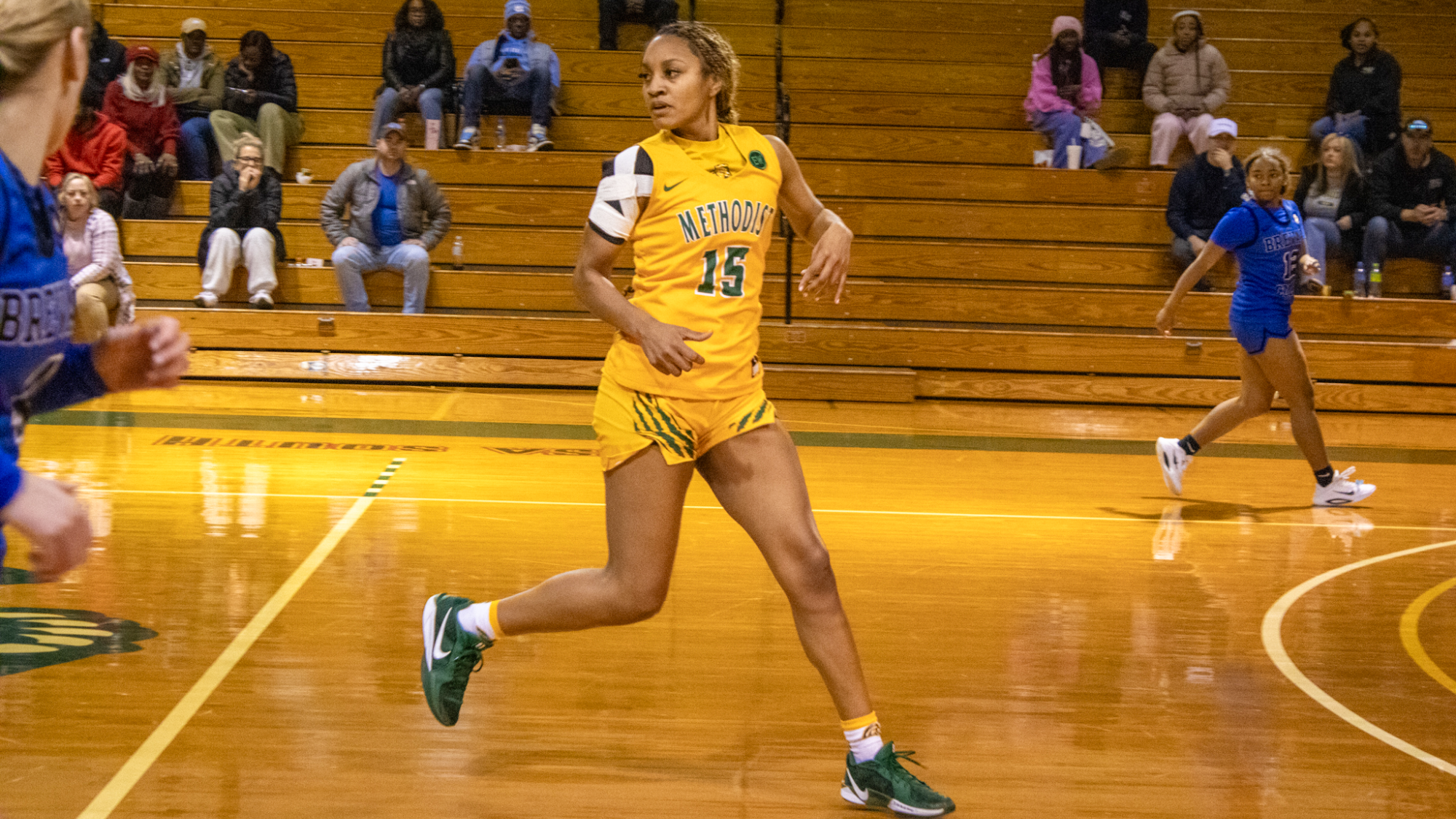 Tori Coleman running down court