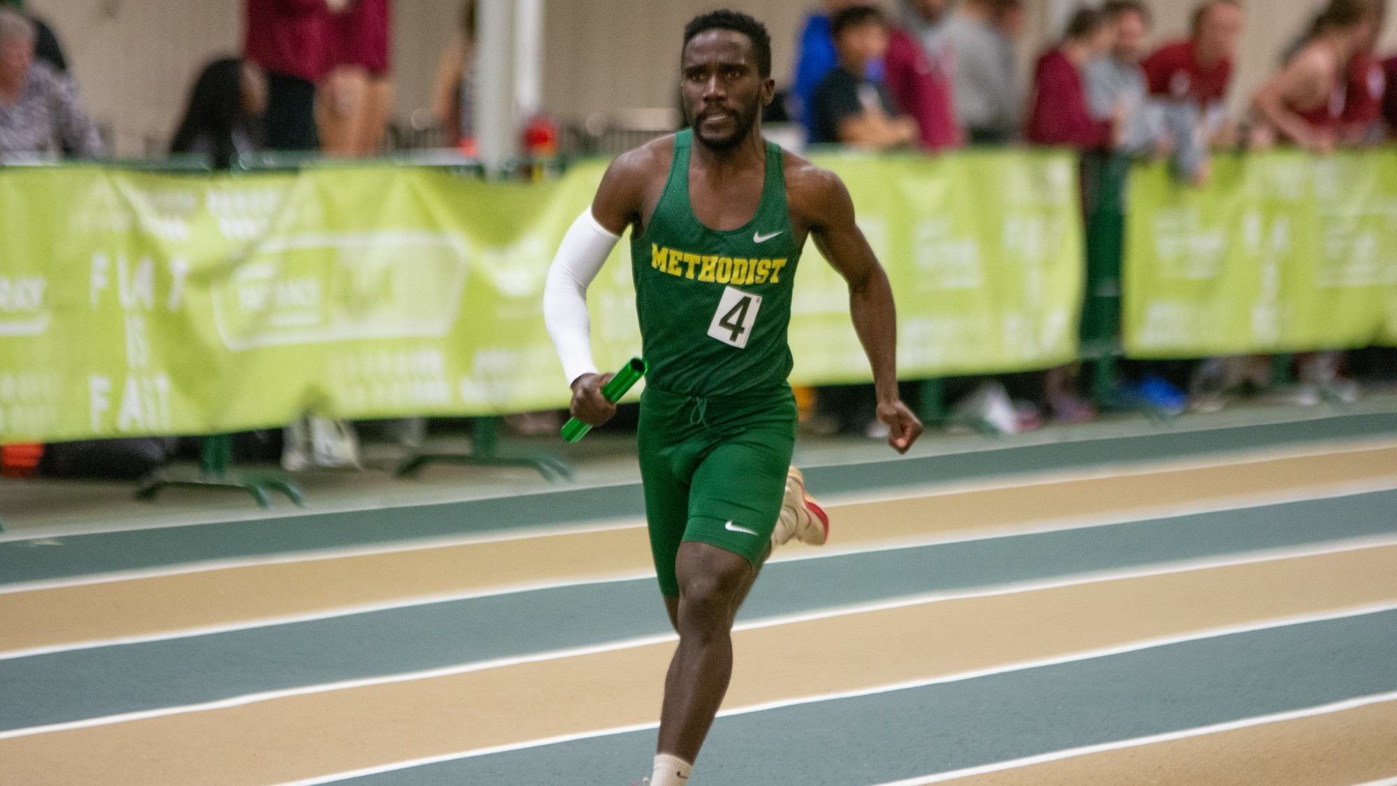 Rafael Shilengitha running a relay leg at the 2025 USA South Indoor Championships