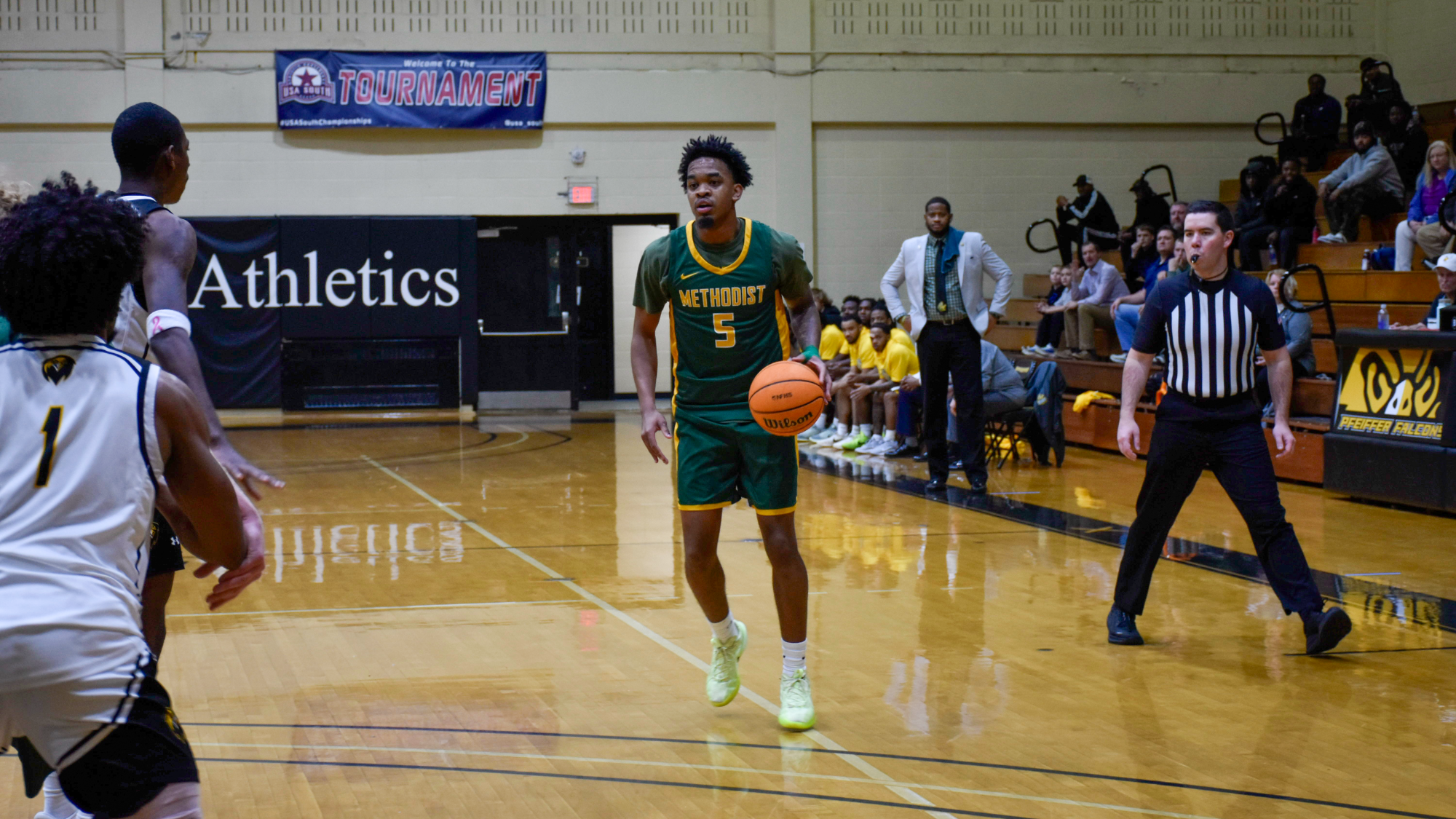 KJ Brooks dribbling at Pfeiffer in the USA South Tournament semifinals