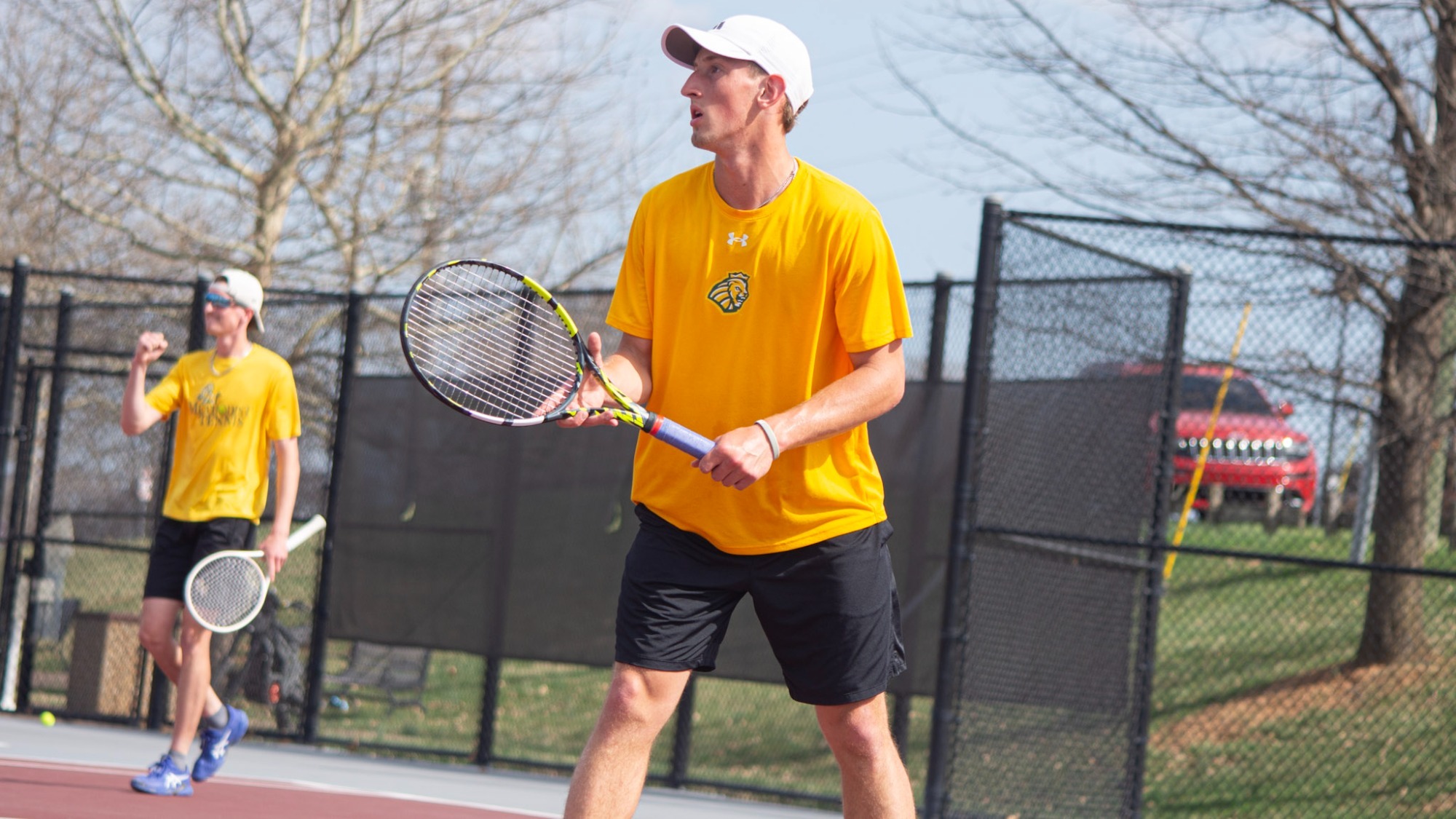Aaron Zoubek during doubles action at Roanoke College