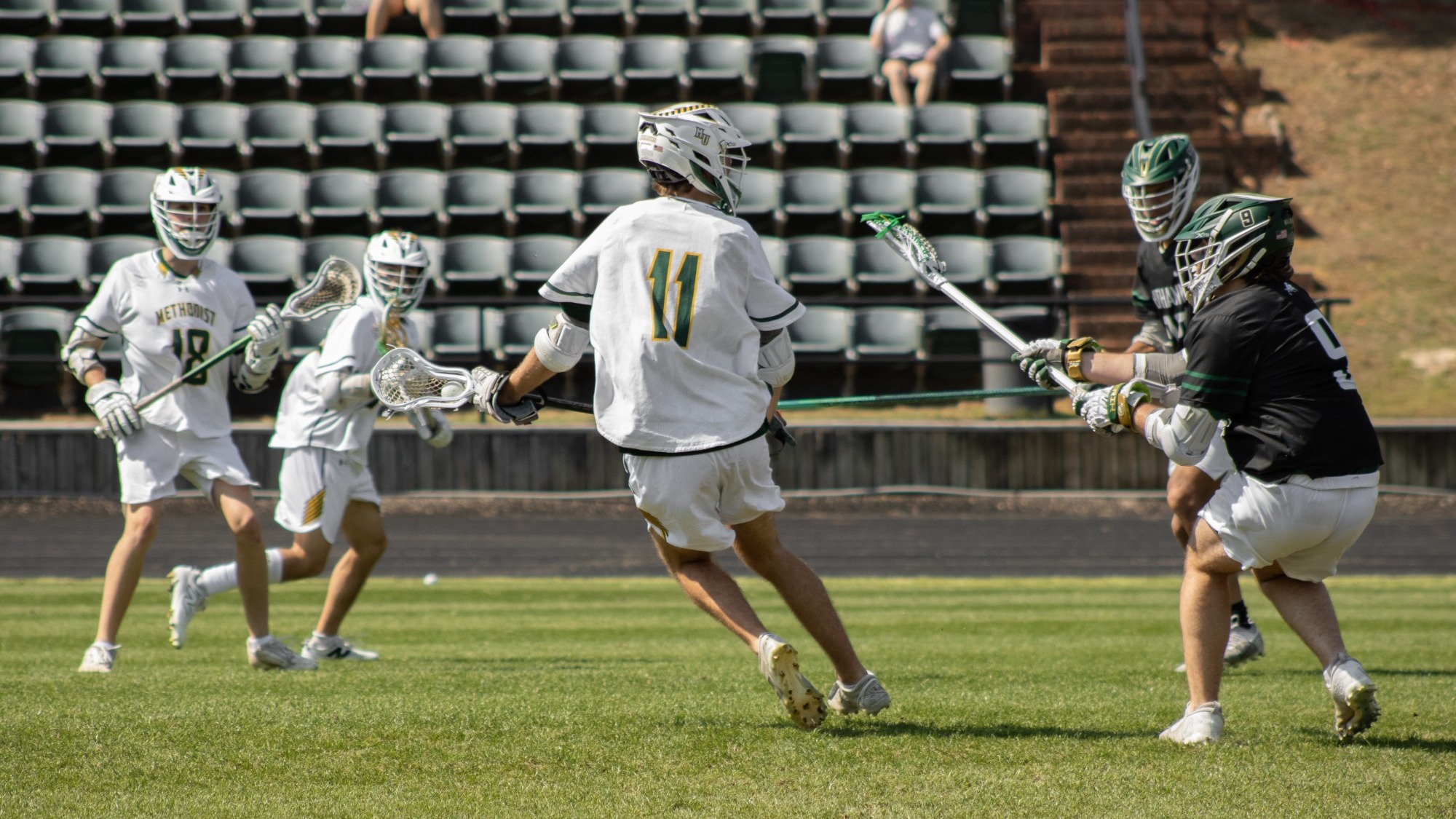 Sam Newton with ball in stick