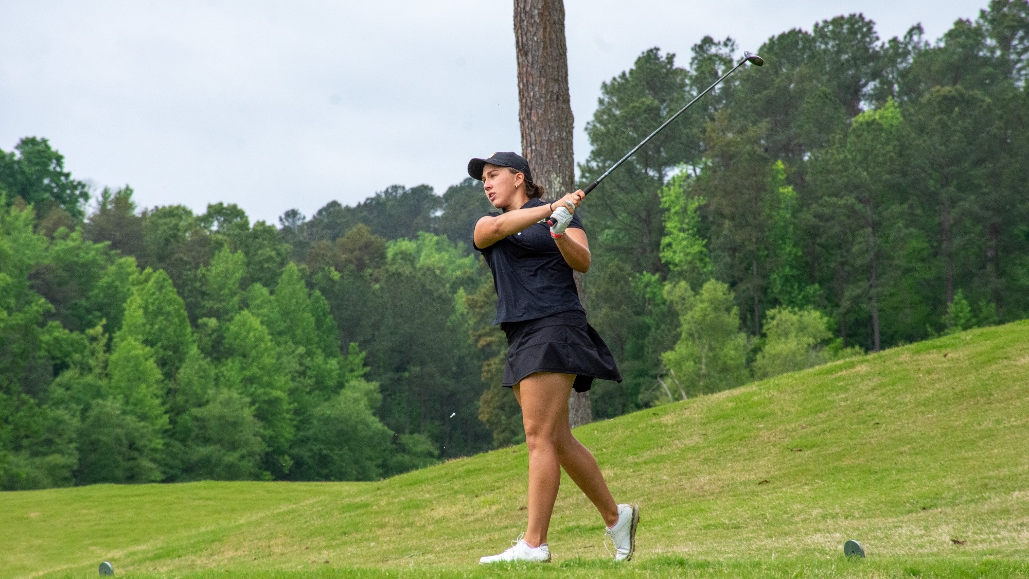 Megan Kestner swinging driver