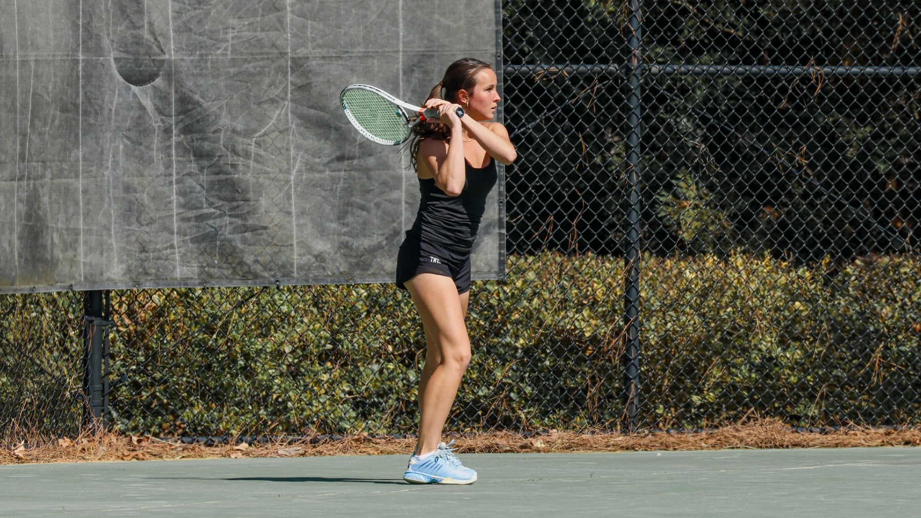 Shea Bieniek with the backhand return