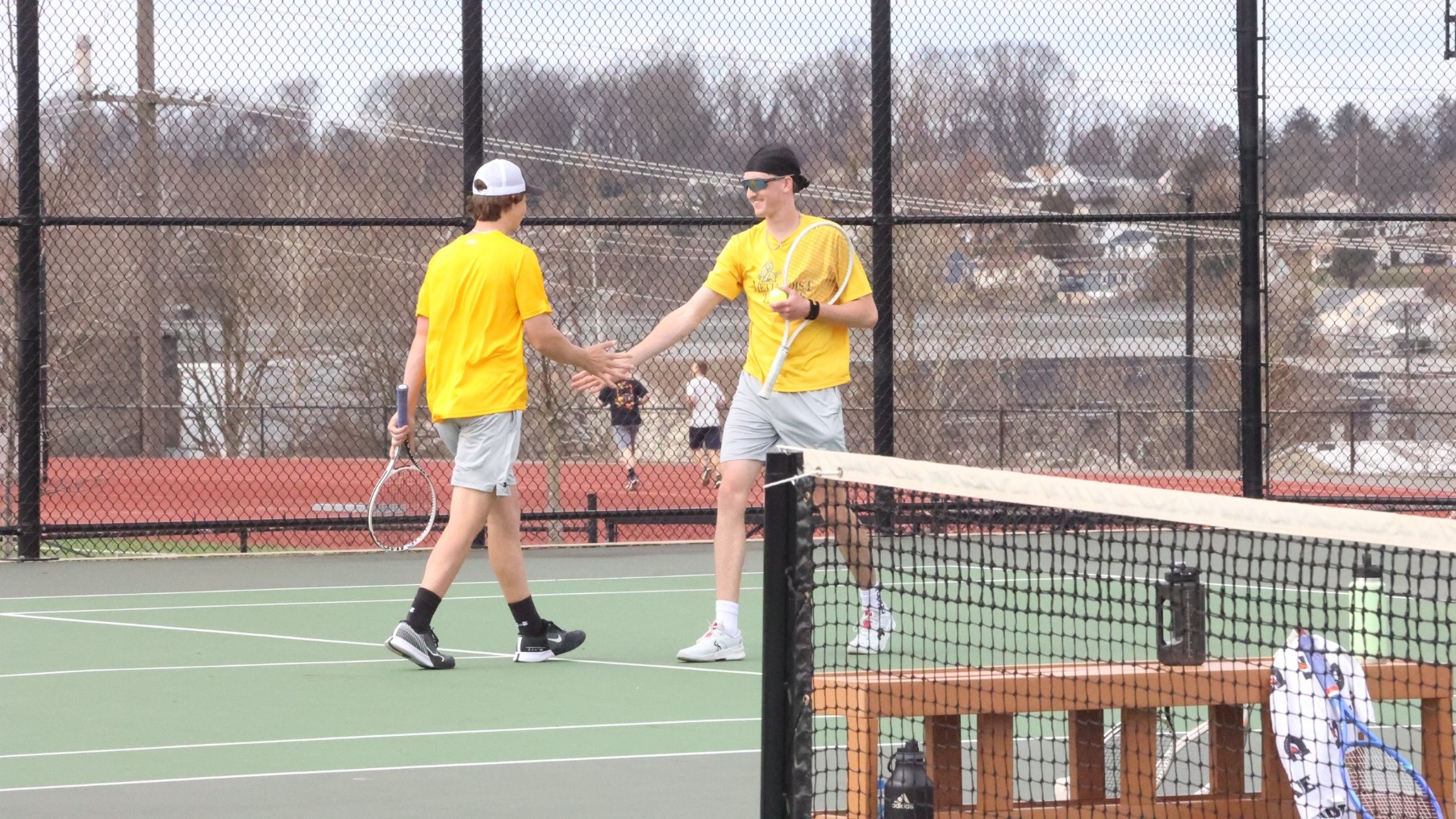 Decklan Rayner and Matt Hurley high fiving