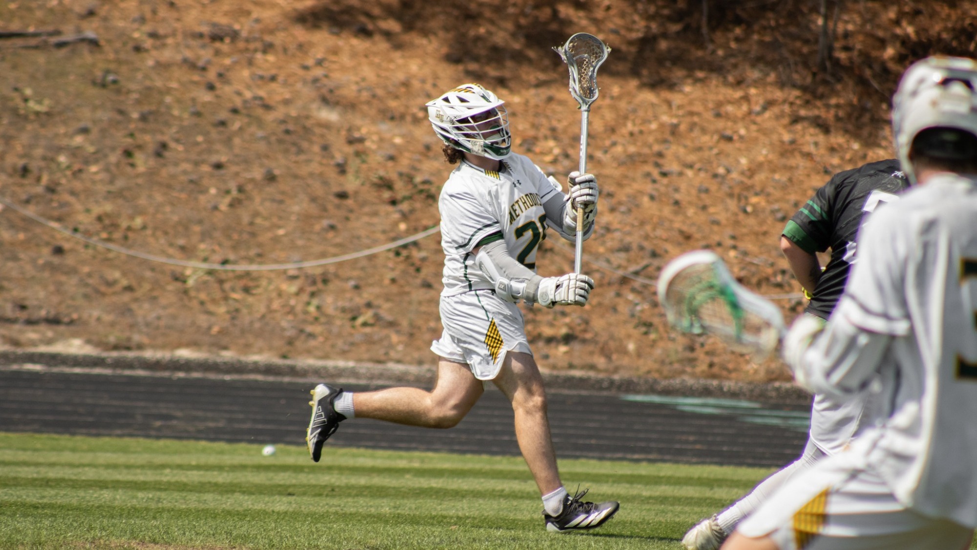 Logan Florio with the ball at home