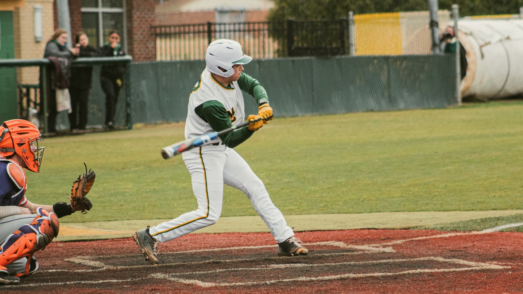 Keegan Megaro hitting at home