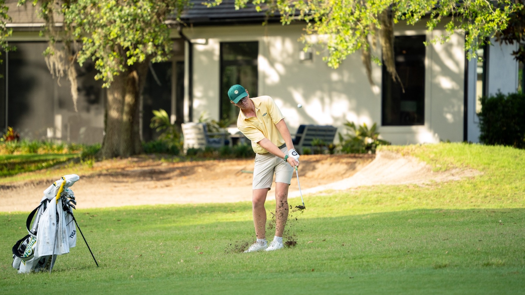 William Plageman chipping in the rough at the NCAA
