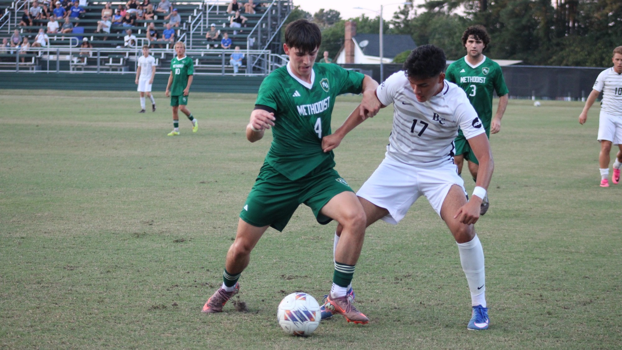 Brogan Murphy trying to get the ball from foe