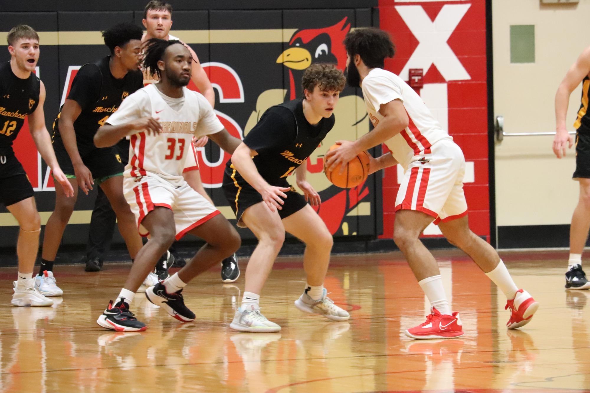 Cardinals Snap Spartans' Win Streak, Bryant Smith Named to All