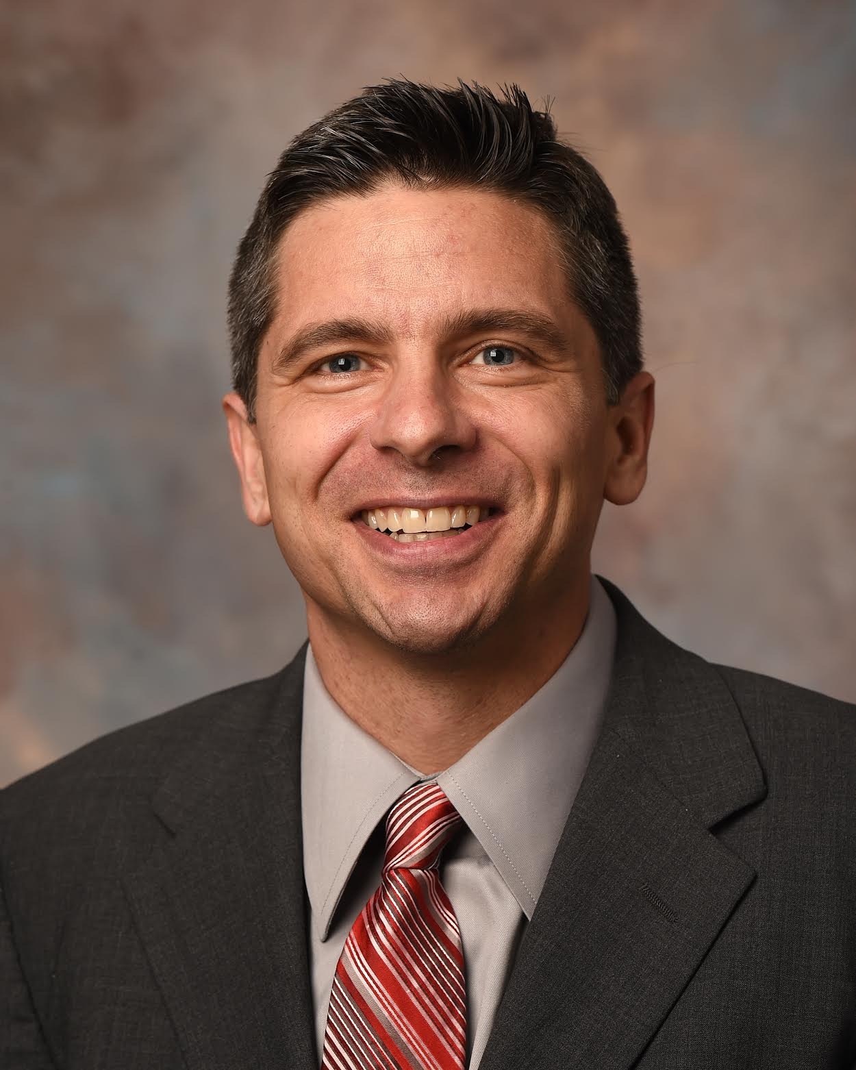 Head Coach Kip Simons