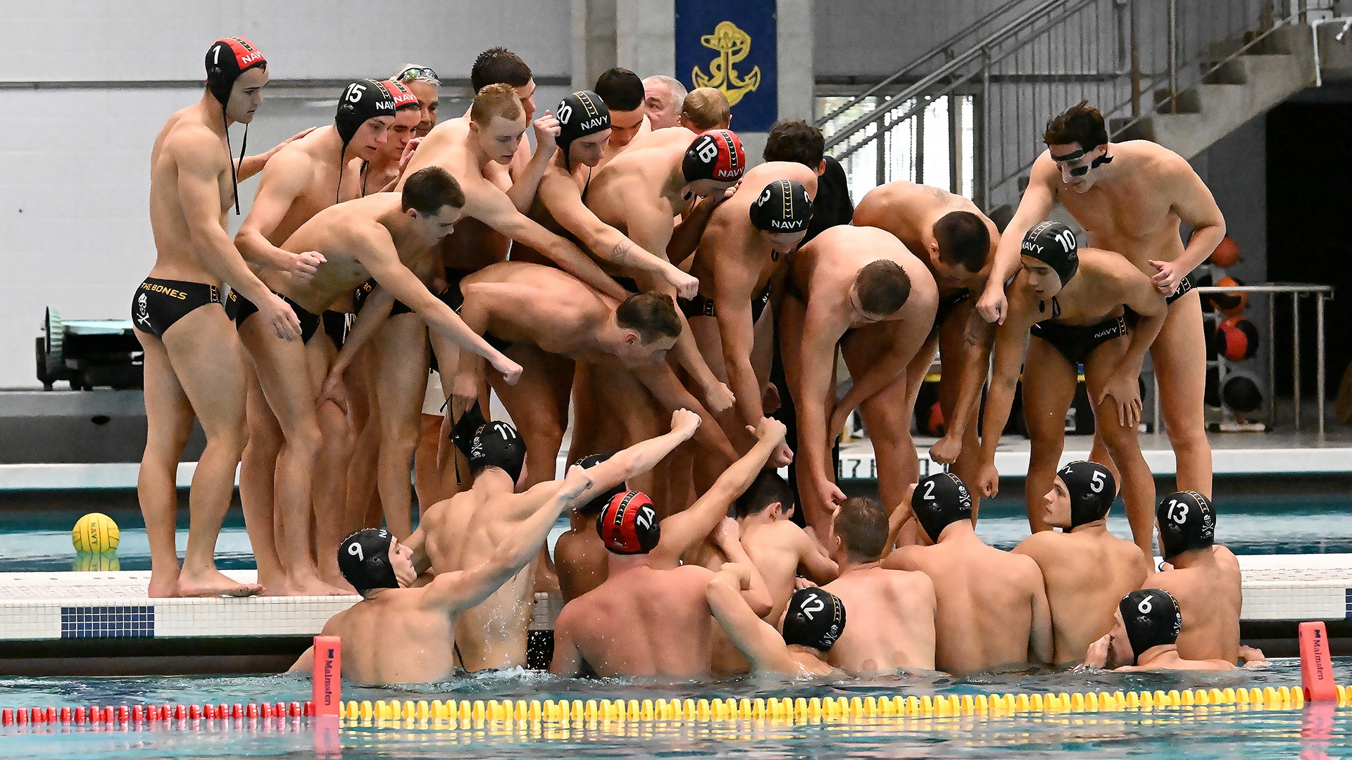 2025 Water Polo Team Huddle at Timeout