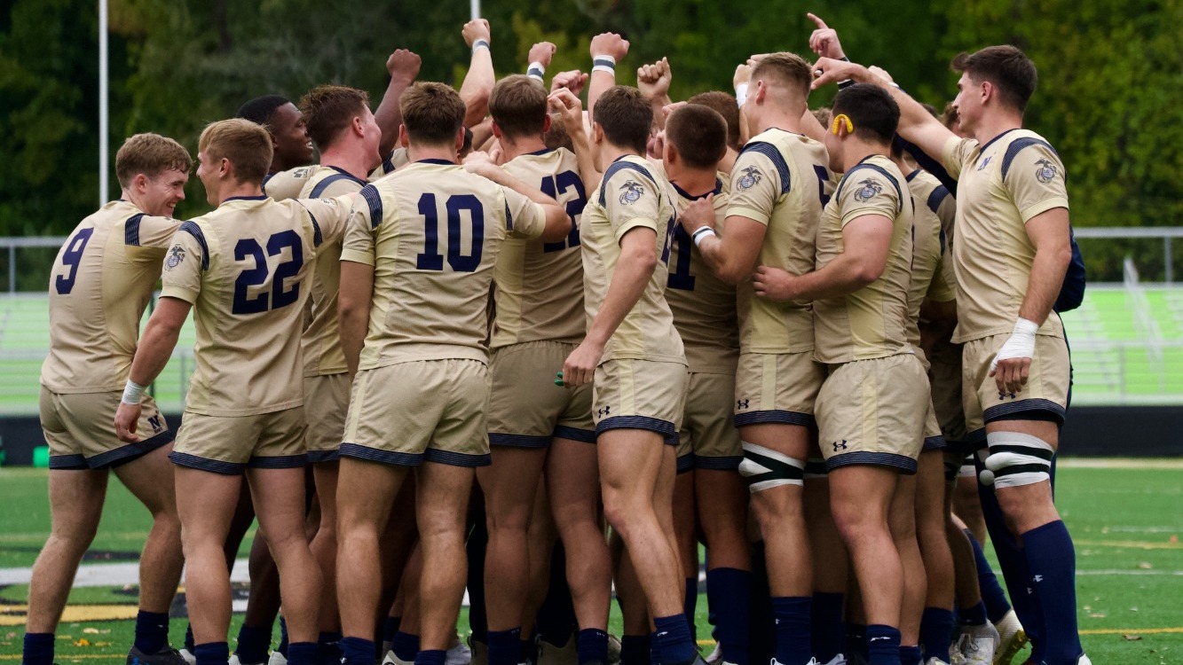 Men's Rugby Huddle vs. Life