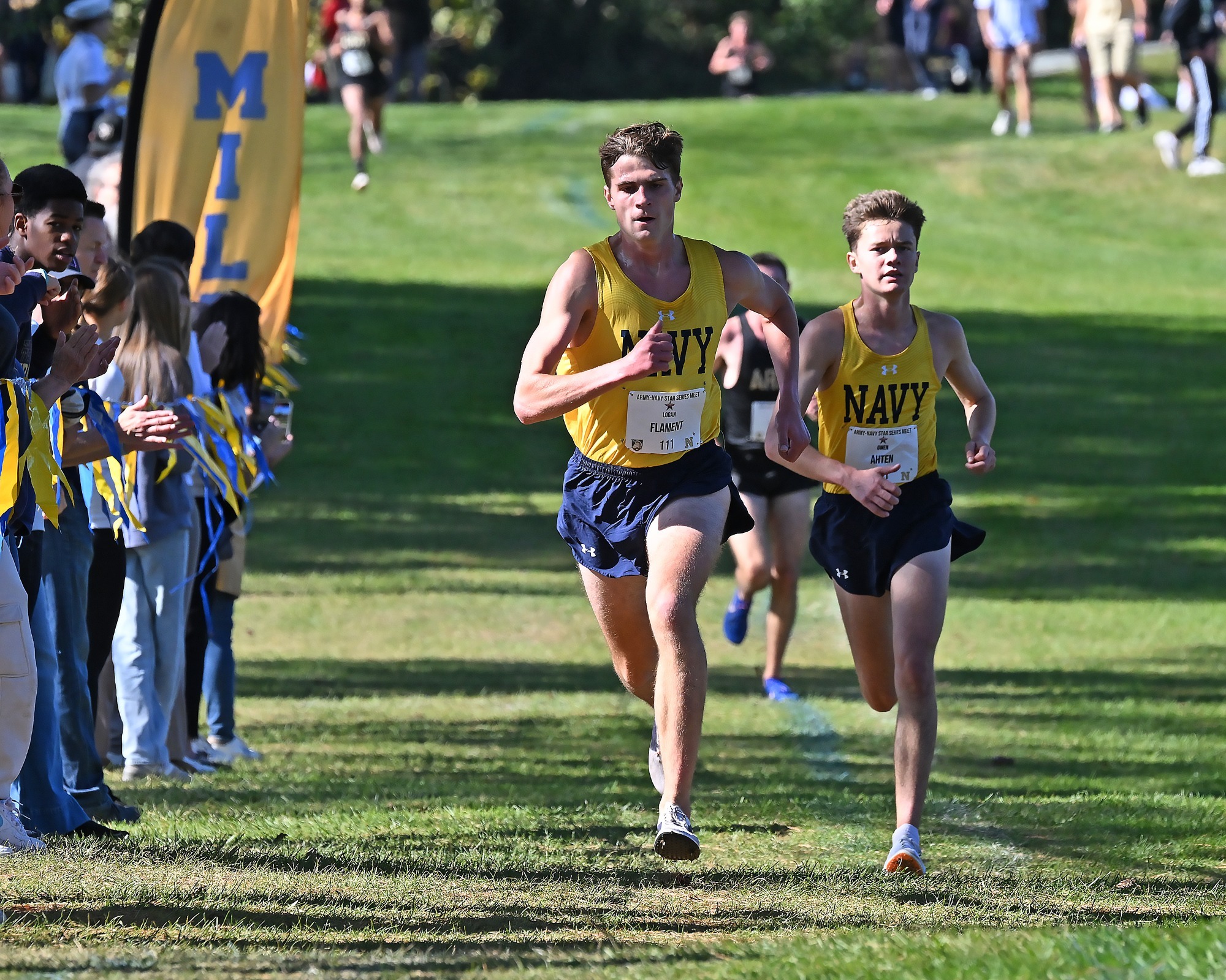 Logan Flament leads the way for the Navy Men's Cross Country Team